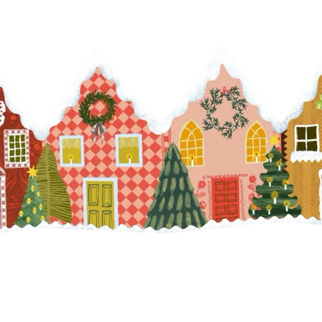 The middle of a Christmas houses concertina card showing 2 red and pink patterned townhouses with Christmas trees outside and snow on the roofs.