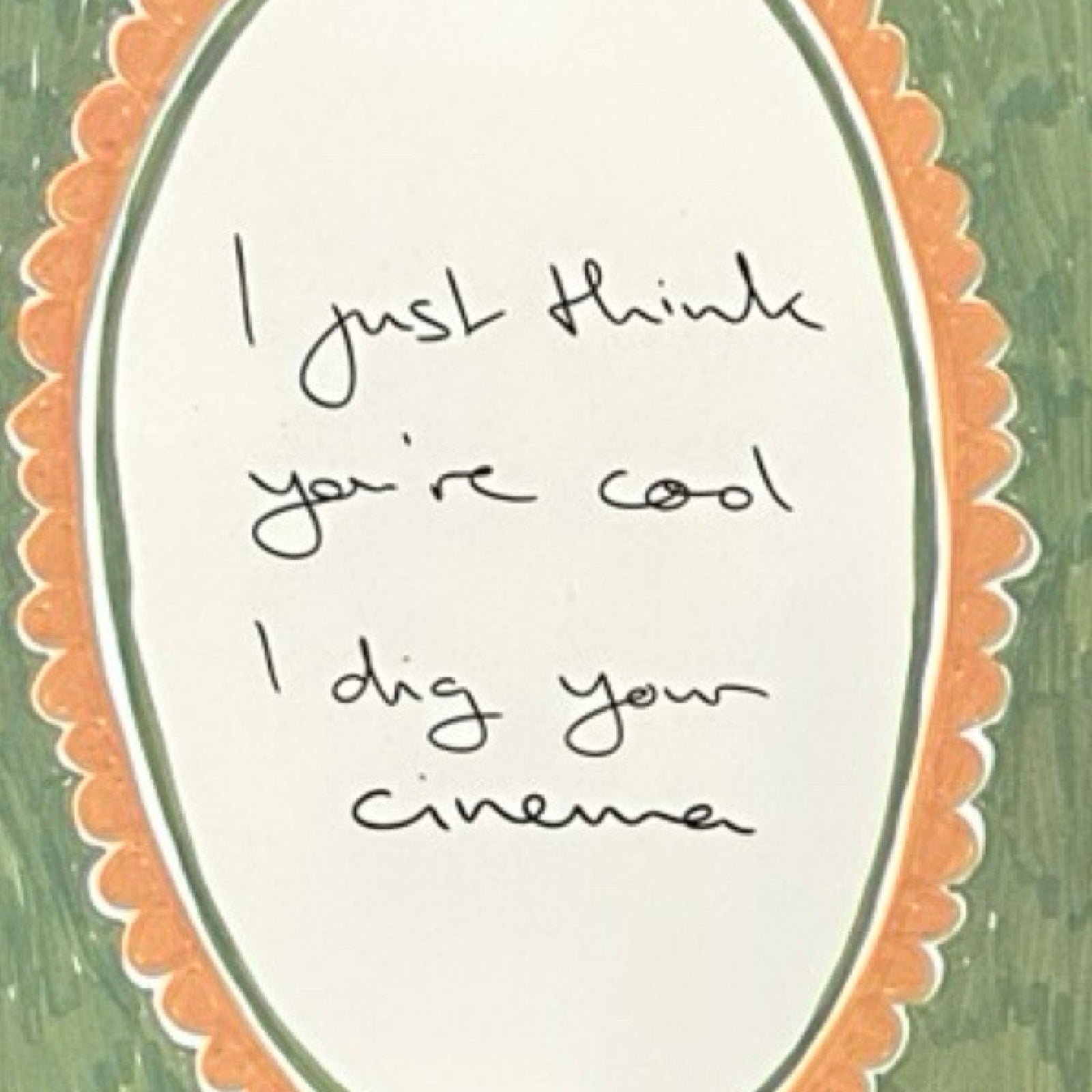 Handwritten text on a framed card with a green background.