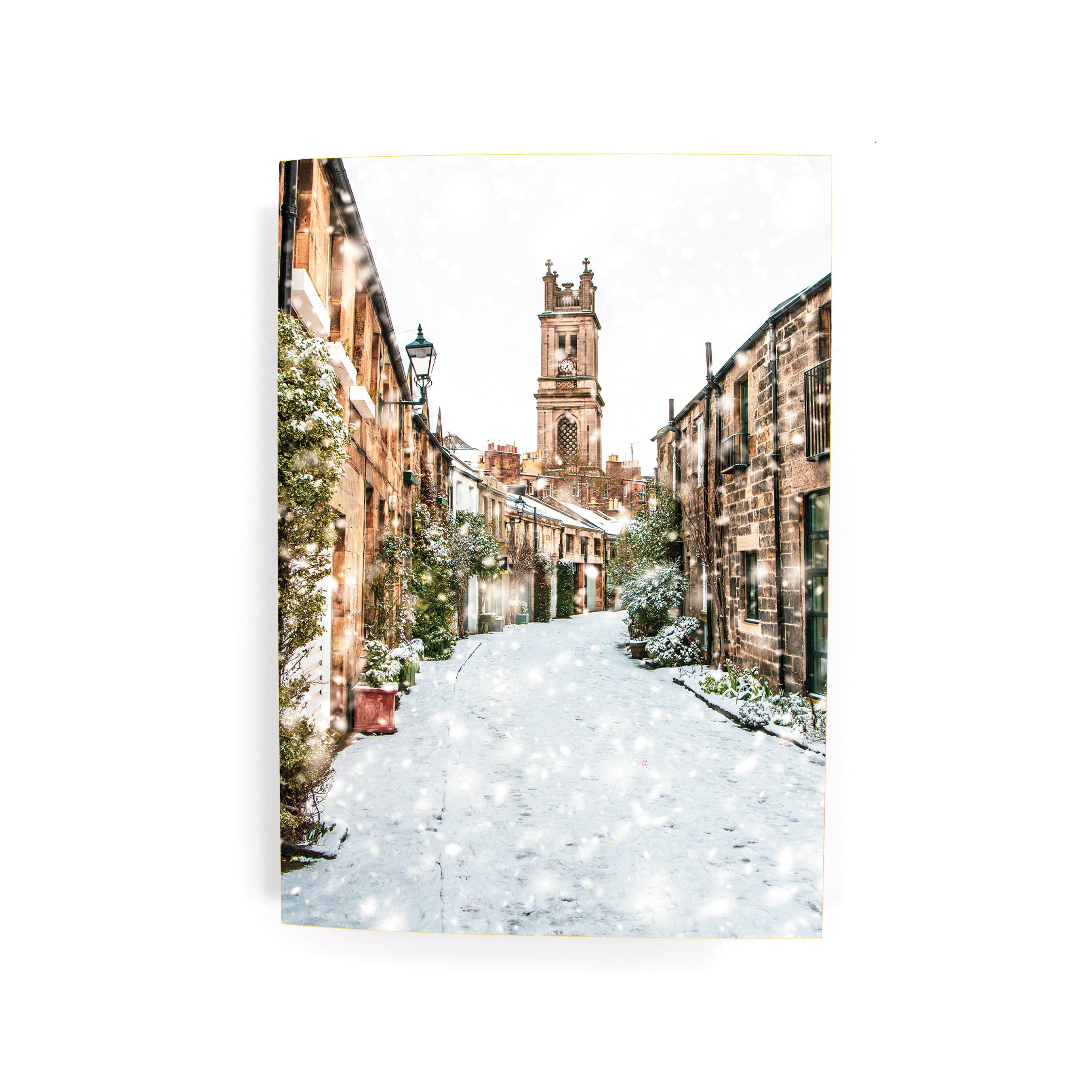 A Christmas card featuring an image of Circus Lane, Edinburgh covered in snow.
