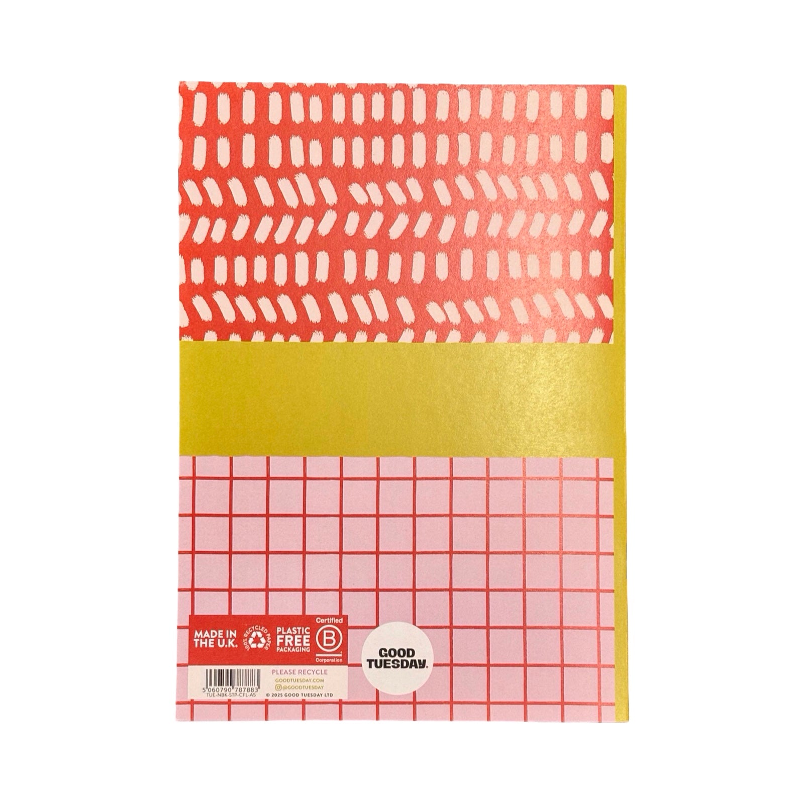 Notebook with red, pink and yellow patterned cover on a white background.