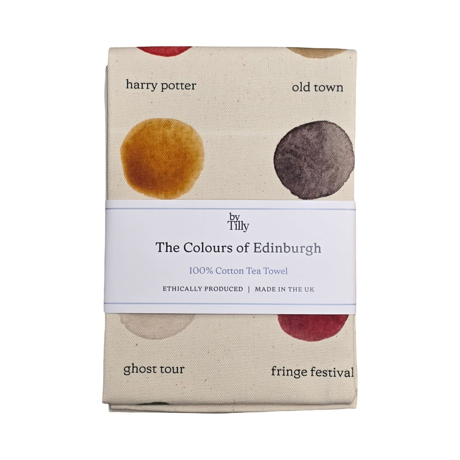 Packaged tea towel with 'The Colours of Edinburgh' design on a white background.