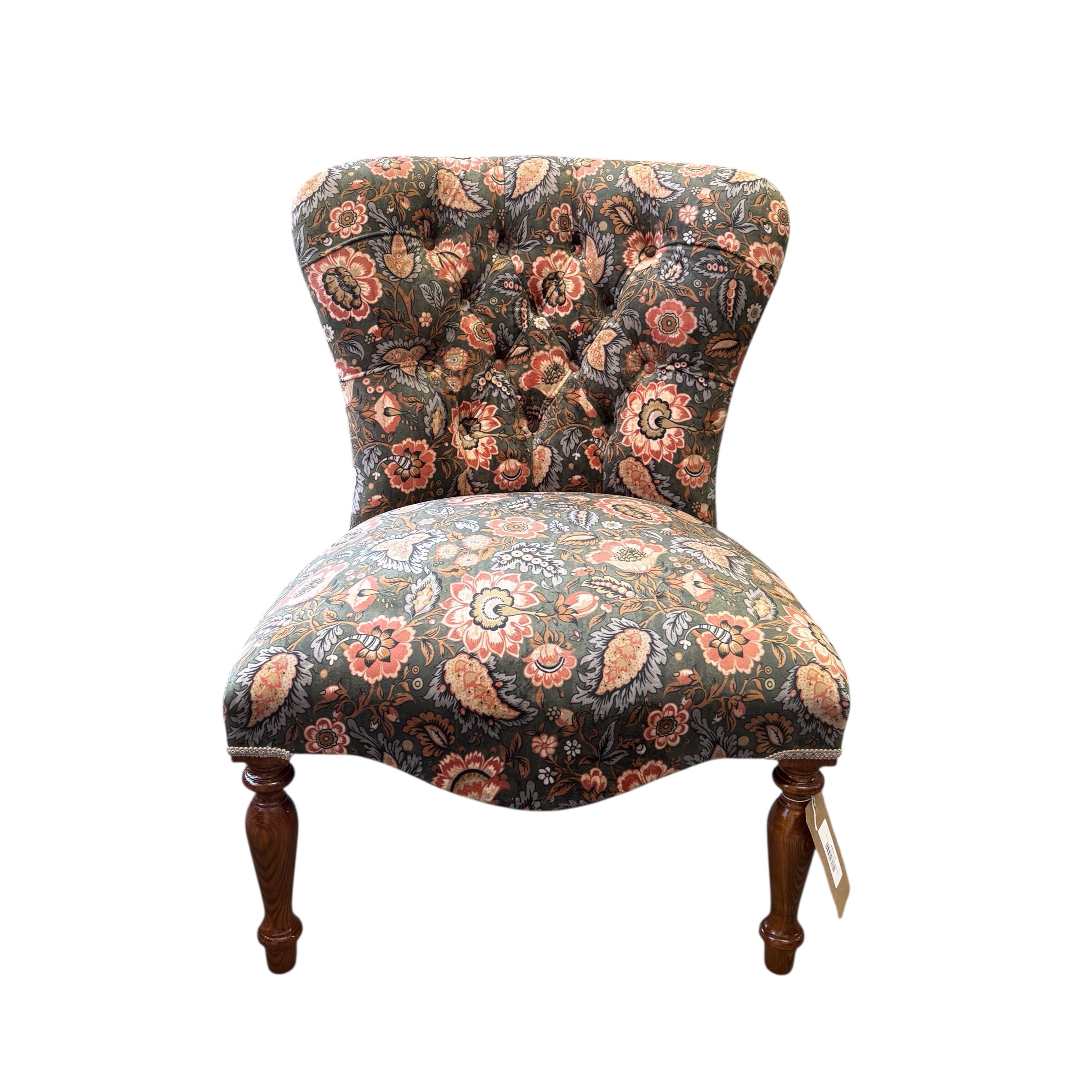 A handmade occasional button-back chair in luxurious light green/grey velvet with coral flowers and pale blue leaves. This chair has a button-back and is finished with cream binding and mahogany stained legs.