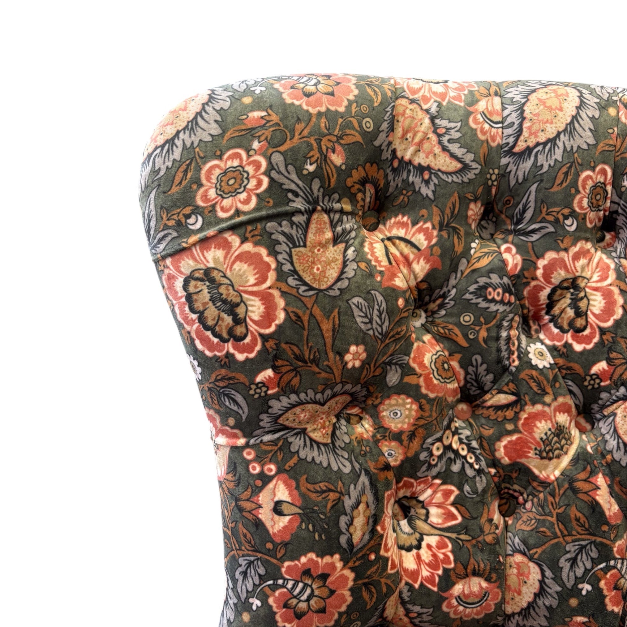 A handmade occasional button-back chair in luxurious light green/grey velvet with coral flowers and pale blue leaves. This chair has a button-back and is finished with cream binding and mahogany stained legs.