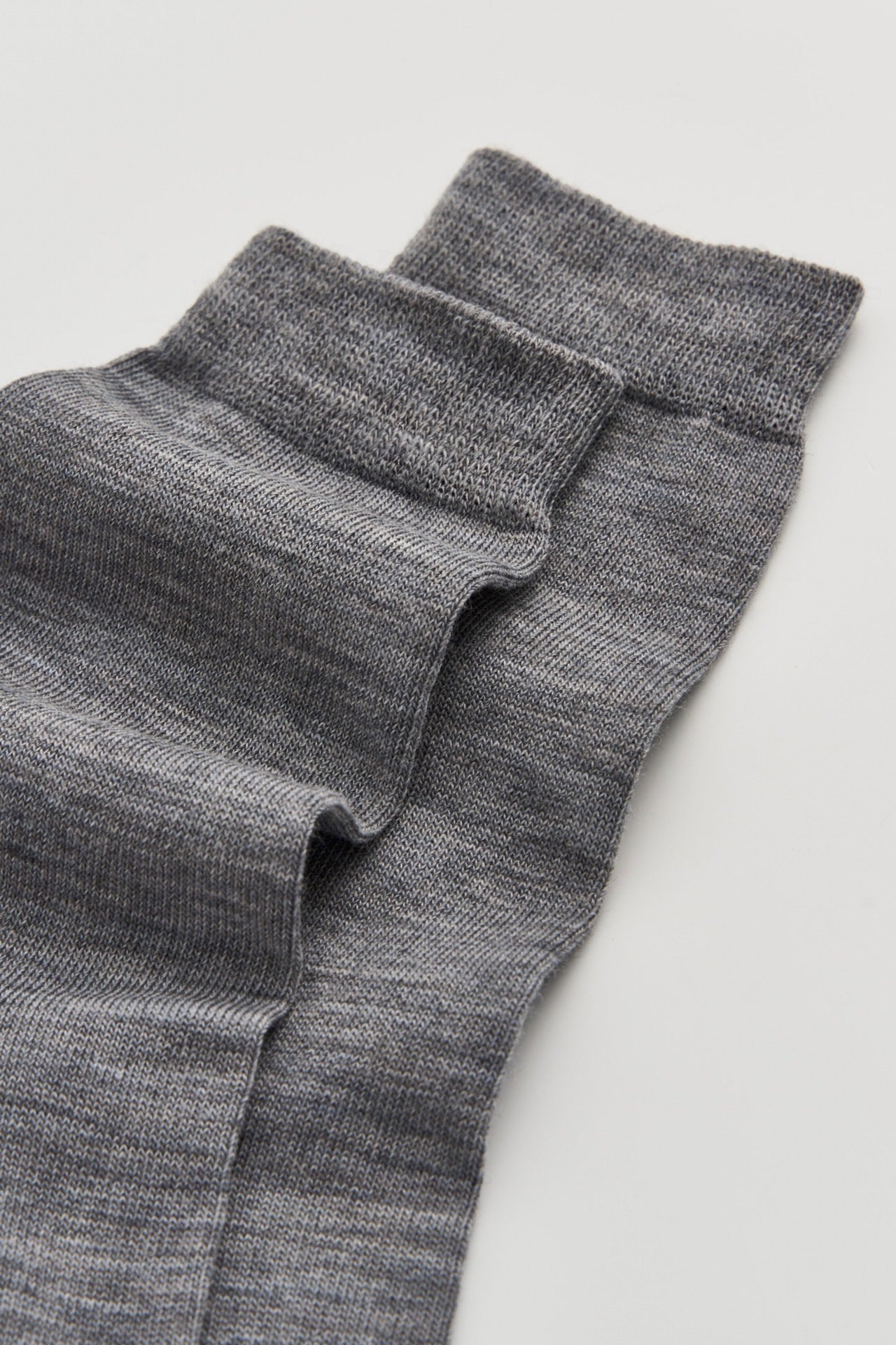 Grey socks on a light background.