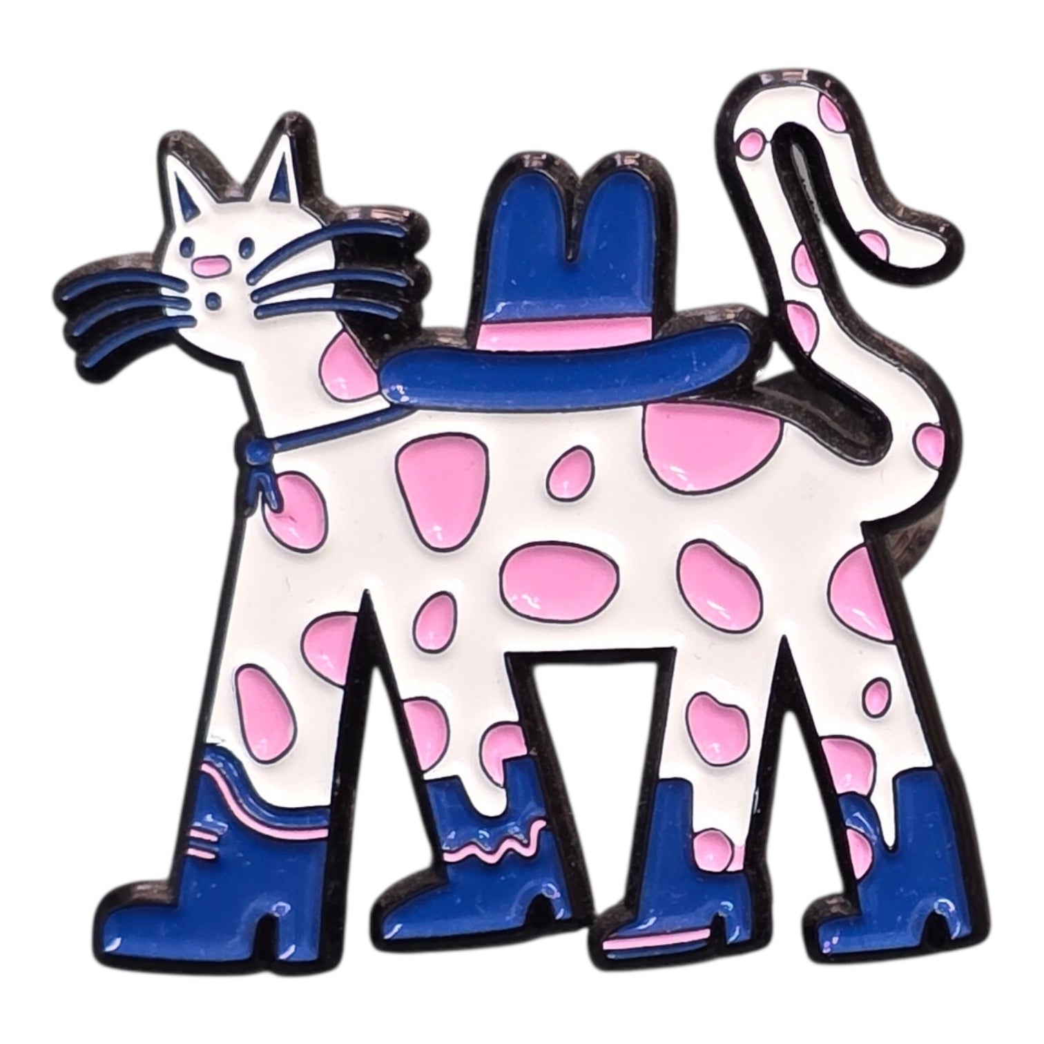 A close up of an enamel pin badge shaped like a cat with cowboy hat.