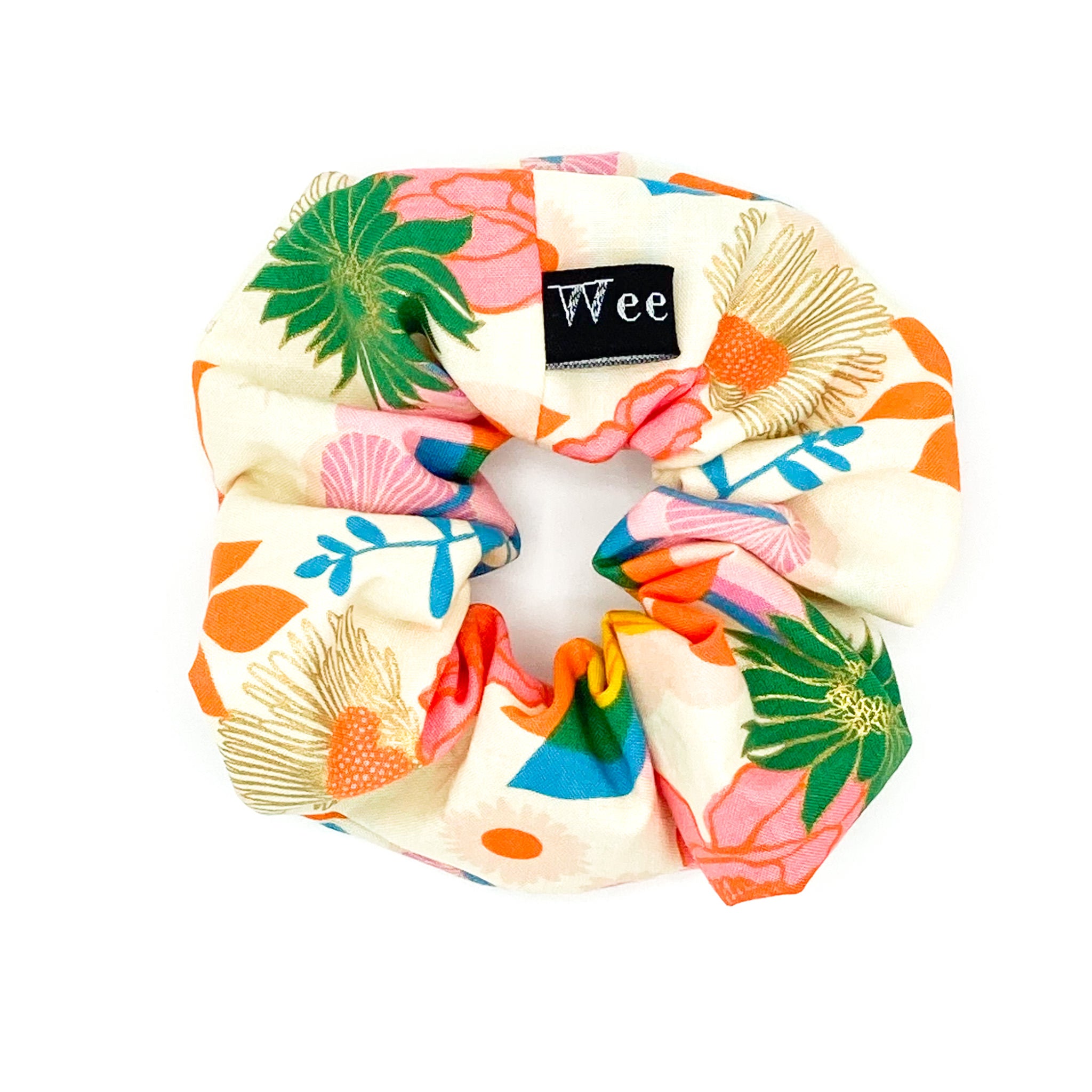 Handmade floral hair scrunchies in bold colours made from 100% cotton fabrics.