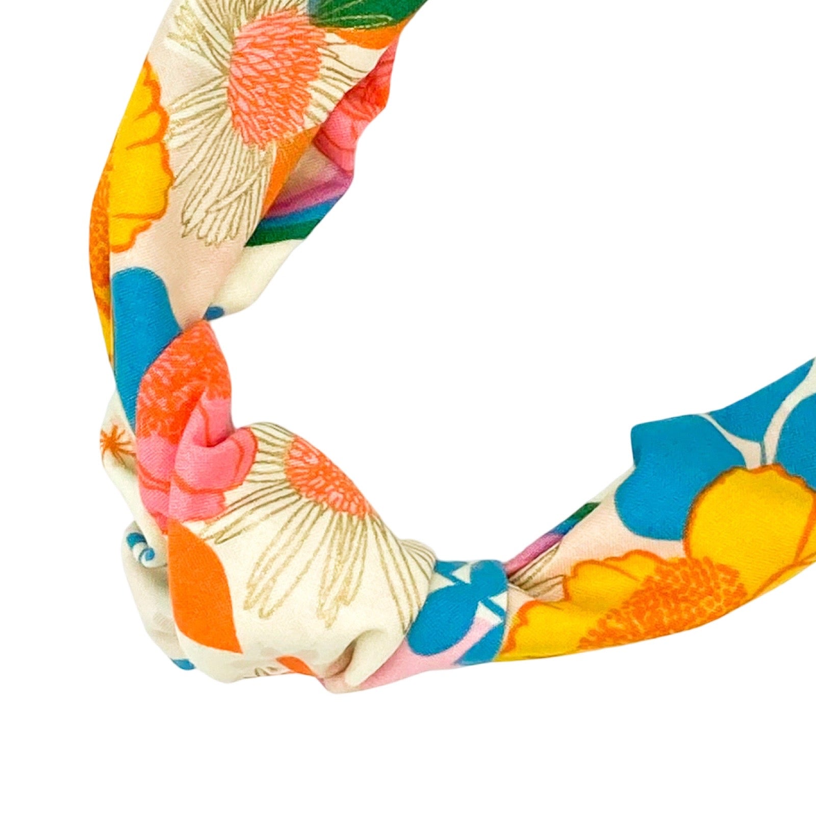 Colourful floral top knot Alice headbands made from 100% cotton fabrics.