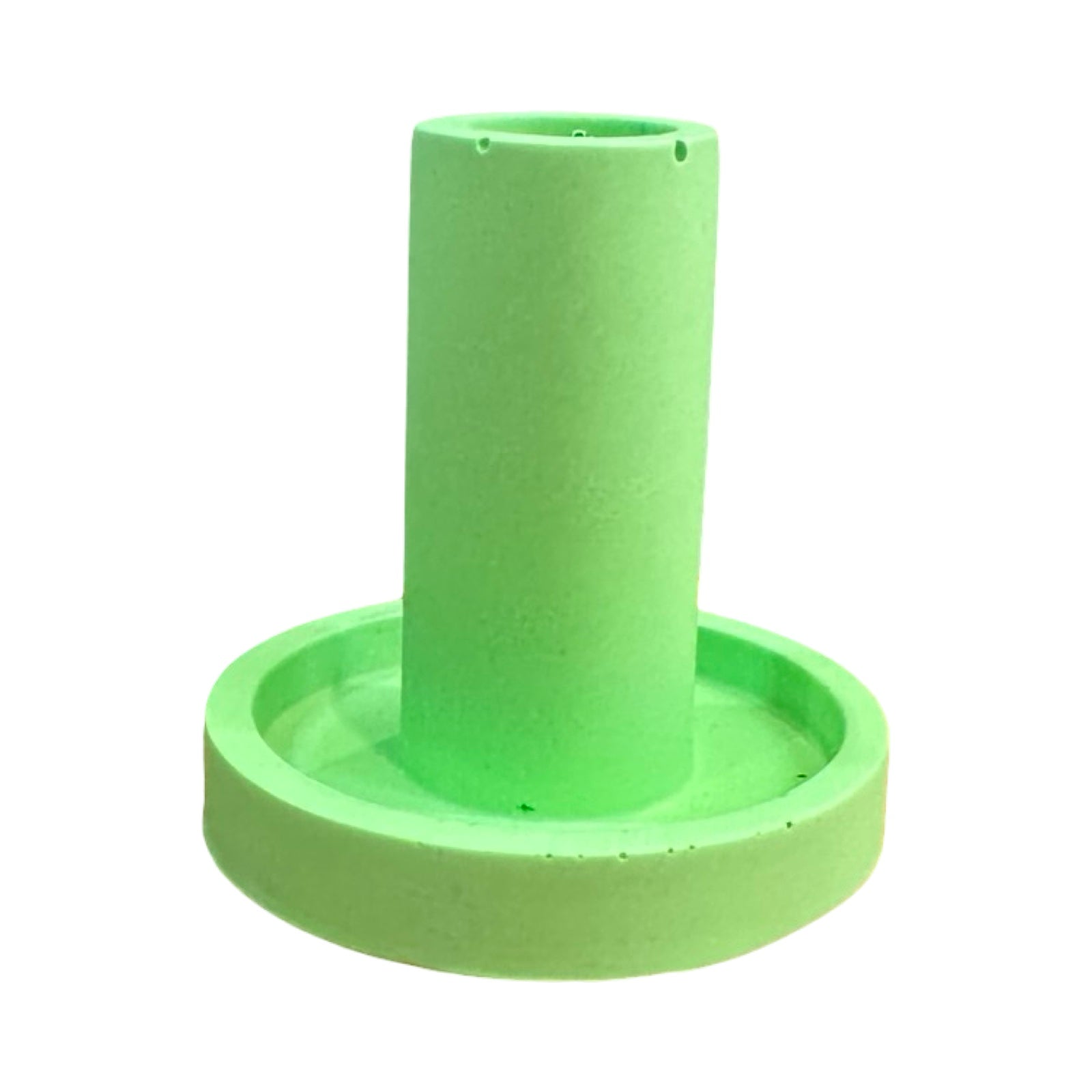 The side of a green cylindrical dinner candle holder with a lip around the bottom to catch any drips.