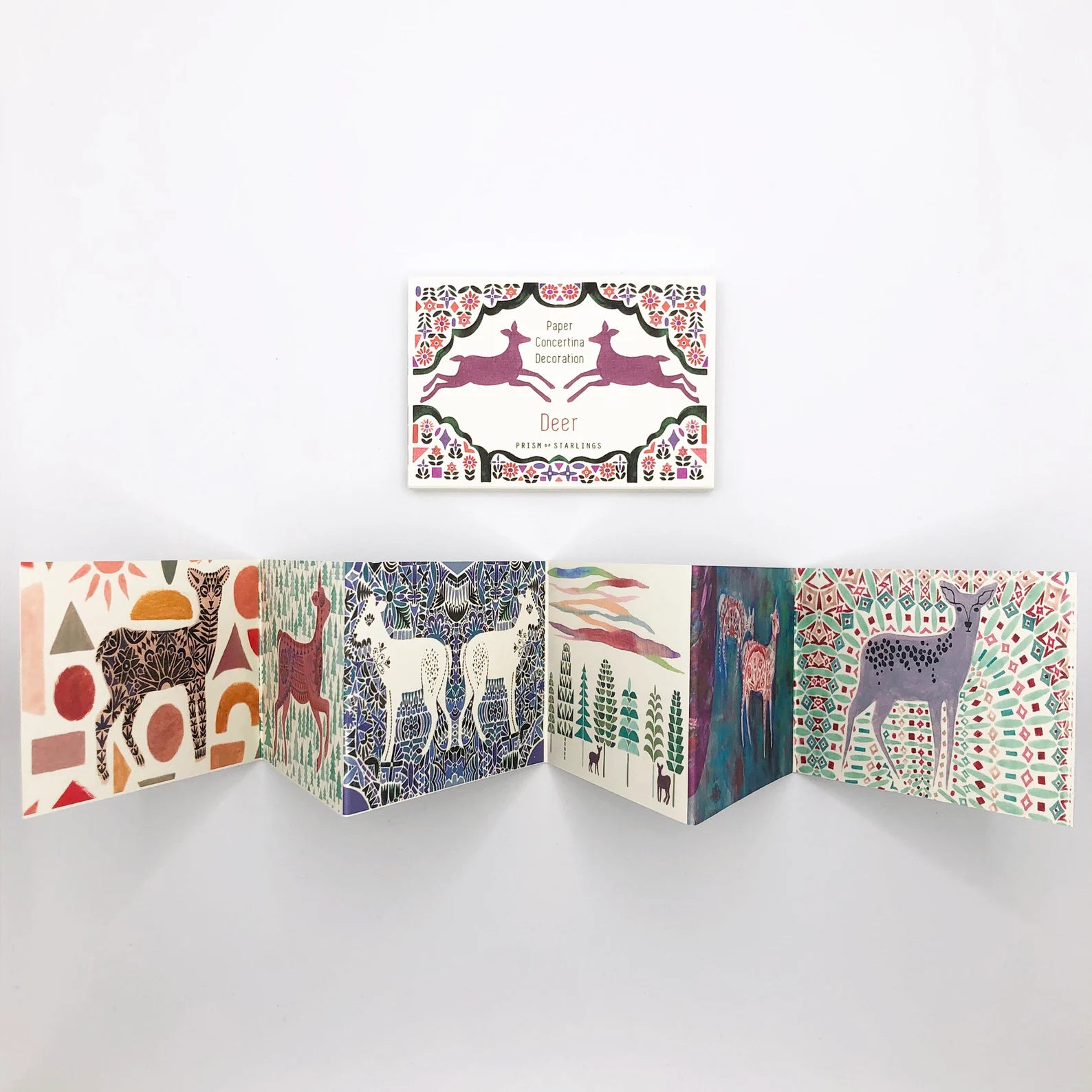 Folded card with animal illustrations and patterns on a white background.