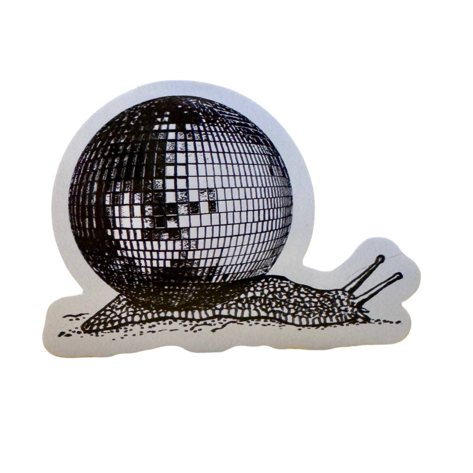 A sticker of a black snail carrying a giant disco ball on its back.