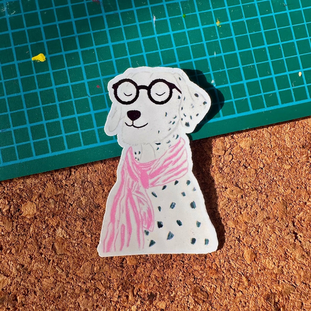 Dog in glasses sticker with two surfaces, cork and green plastic.