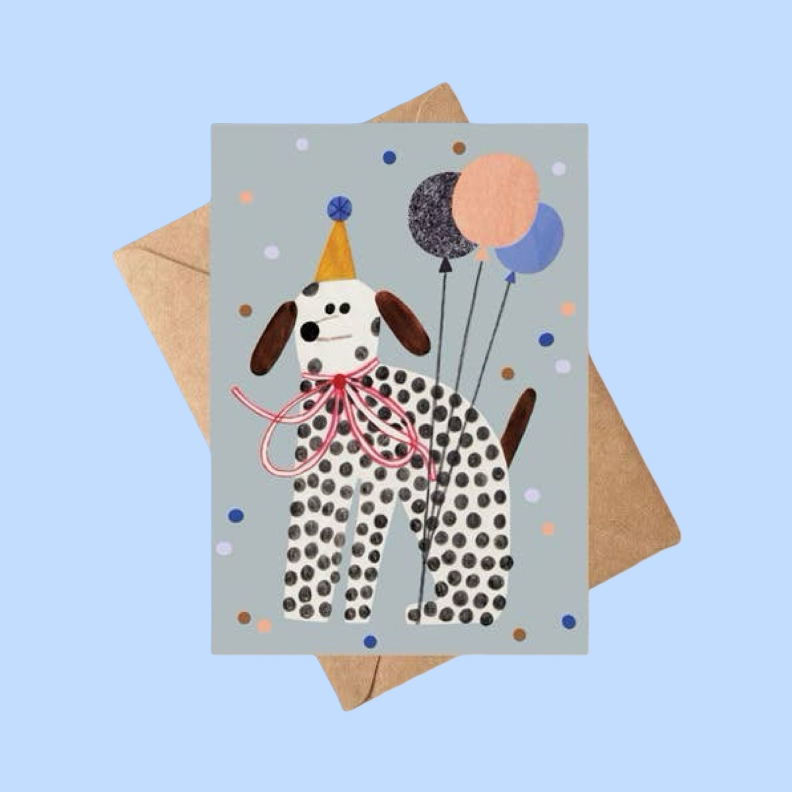 Greeting card with a dog illustration wearing a party hat and balloons, on a light blue background.