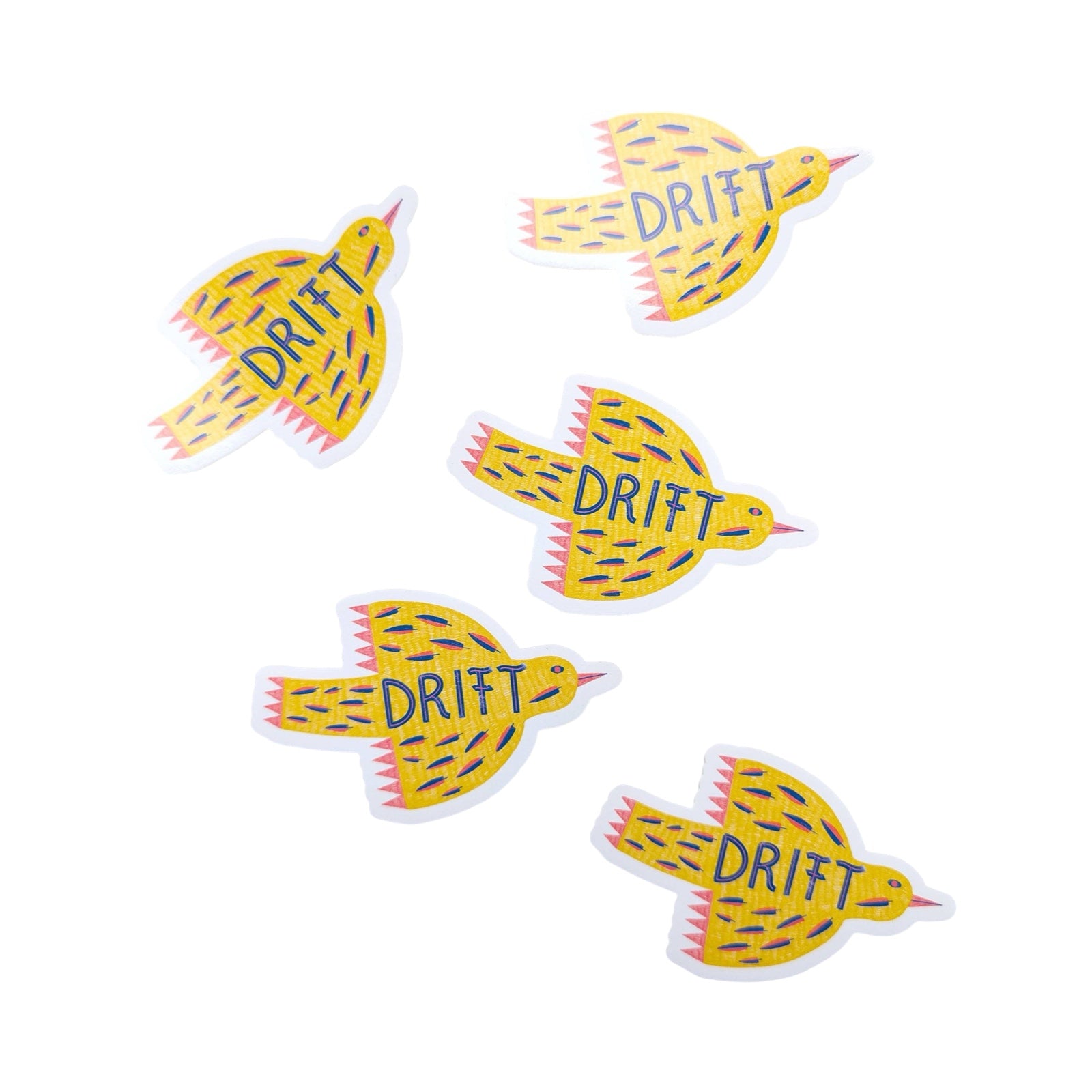 Yellow bird-shaped stickers with 'DRIFT' text on a white background.