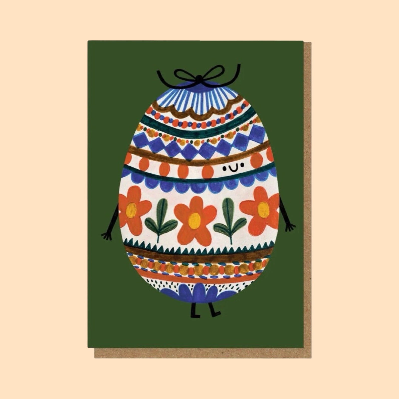 Colourful Easter egg illustration on a green card with a brown envelope and a yellow background.