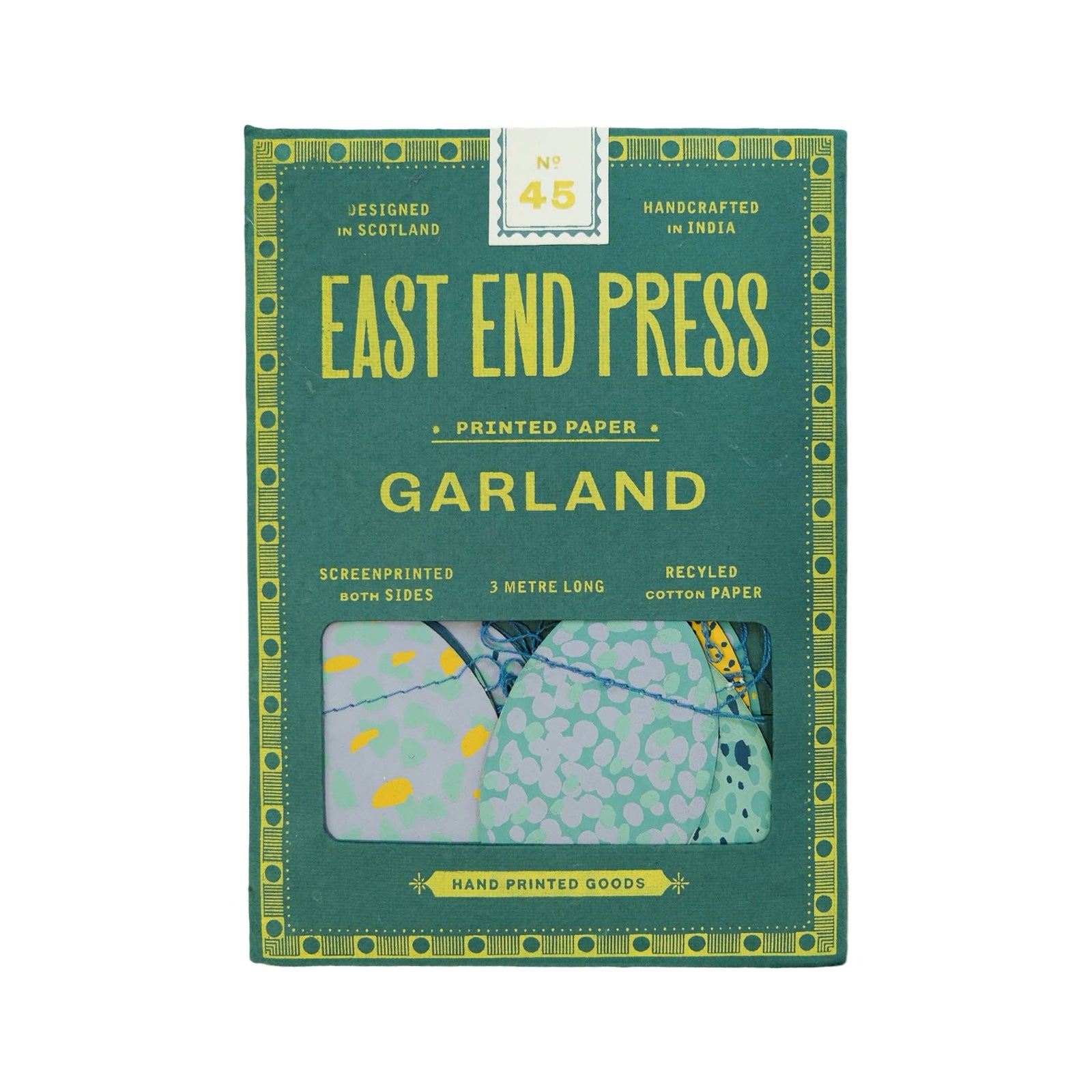 Green paper packet with yellow text for a blue Easter egg paper garland.