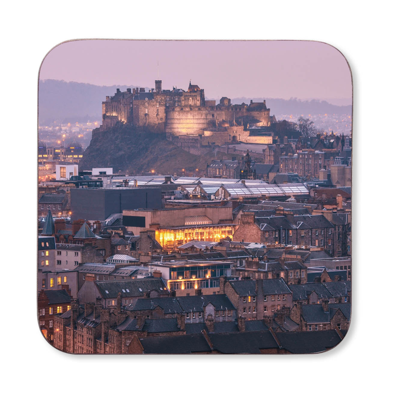 Coaster with a scenic view of Edinburgh Castle at dusk.