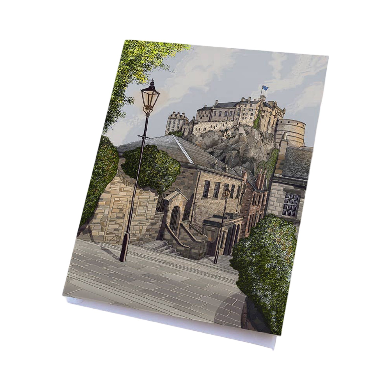 Notebook with a scenic illustration of a castle on a hill.