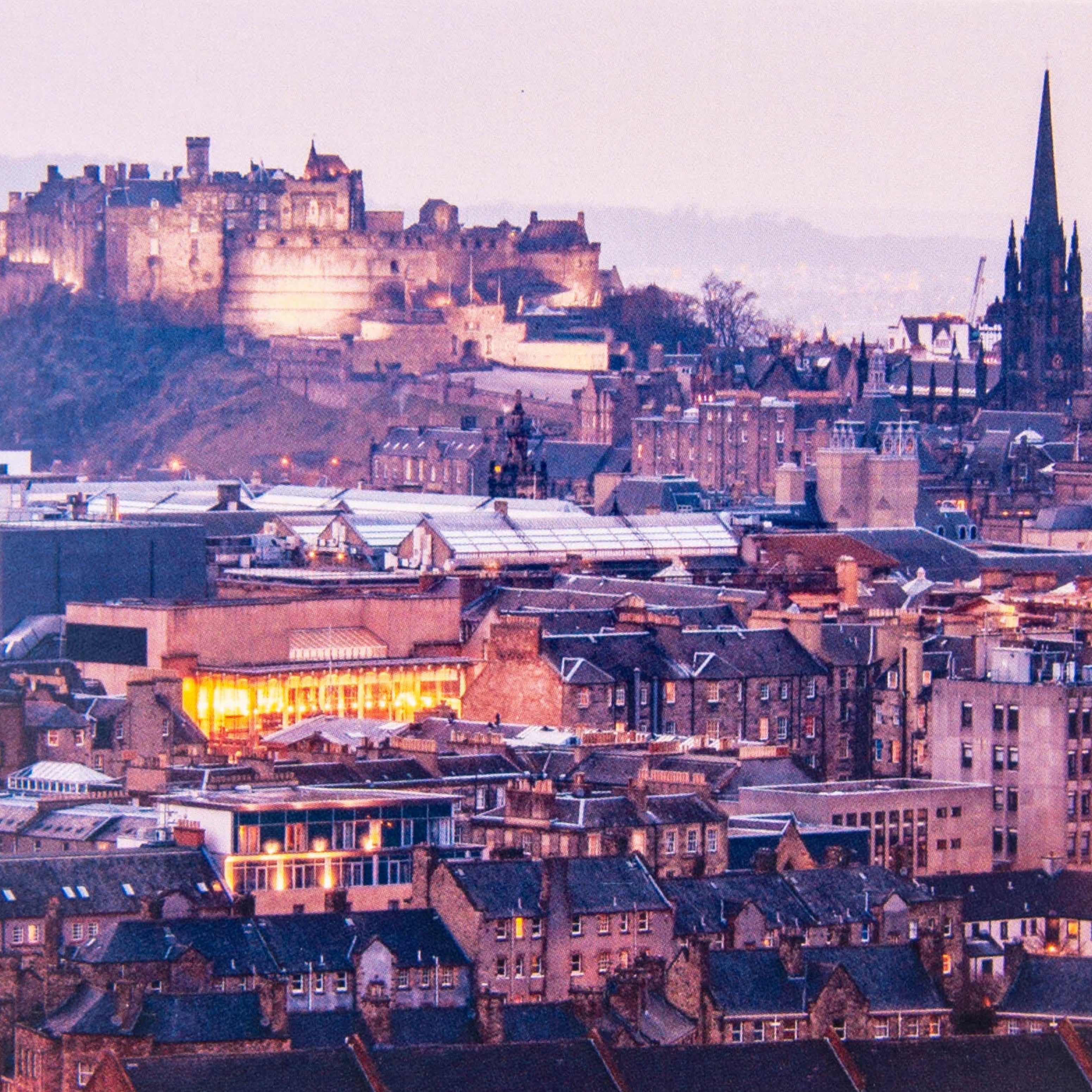A greeting card featuring a photograph of Edinburgh Castle at dusk.