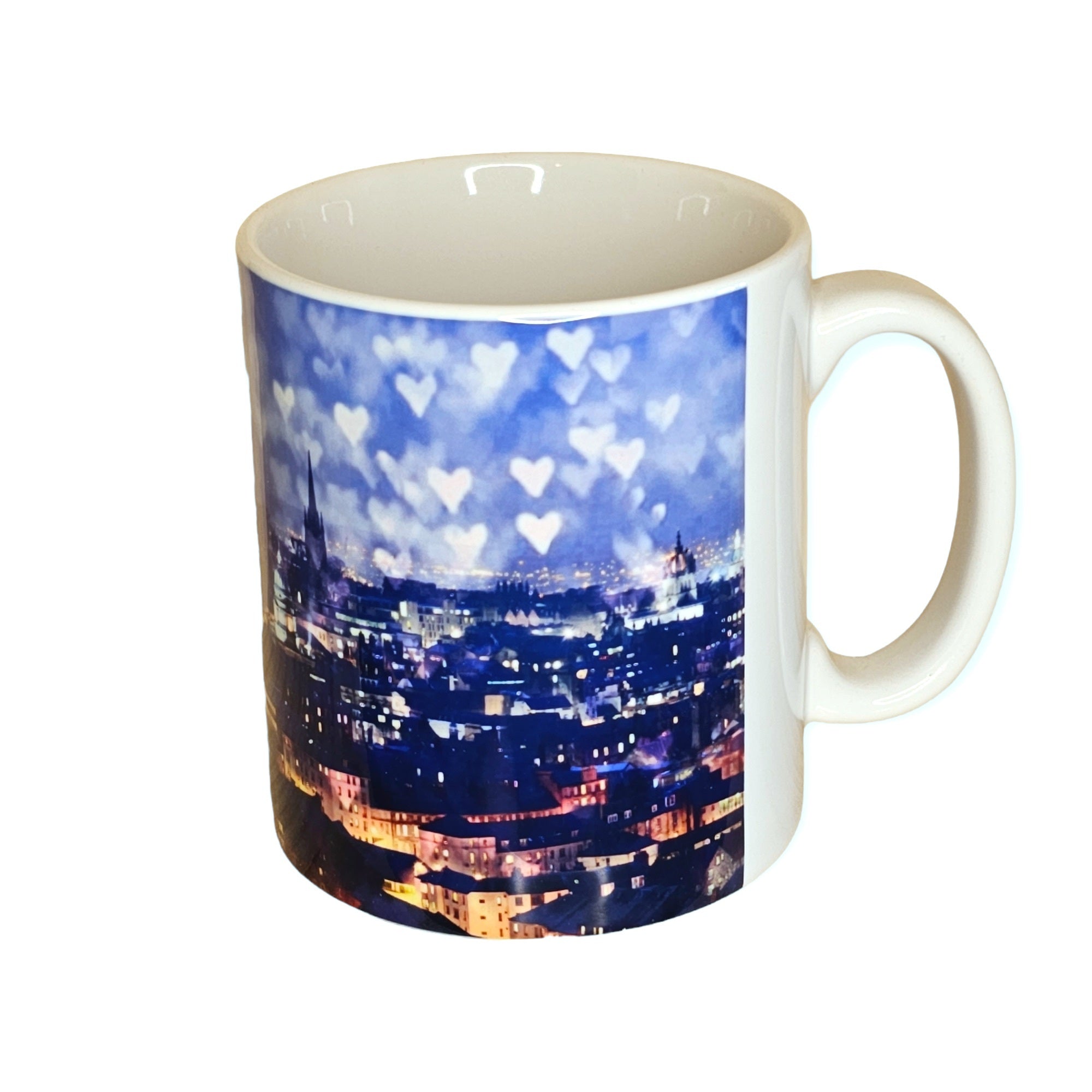An image of a mug featuring Edinburgh Castle surrounded by love hearts.
