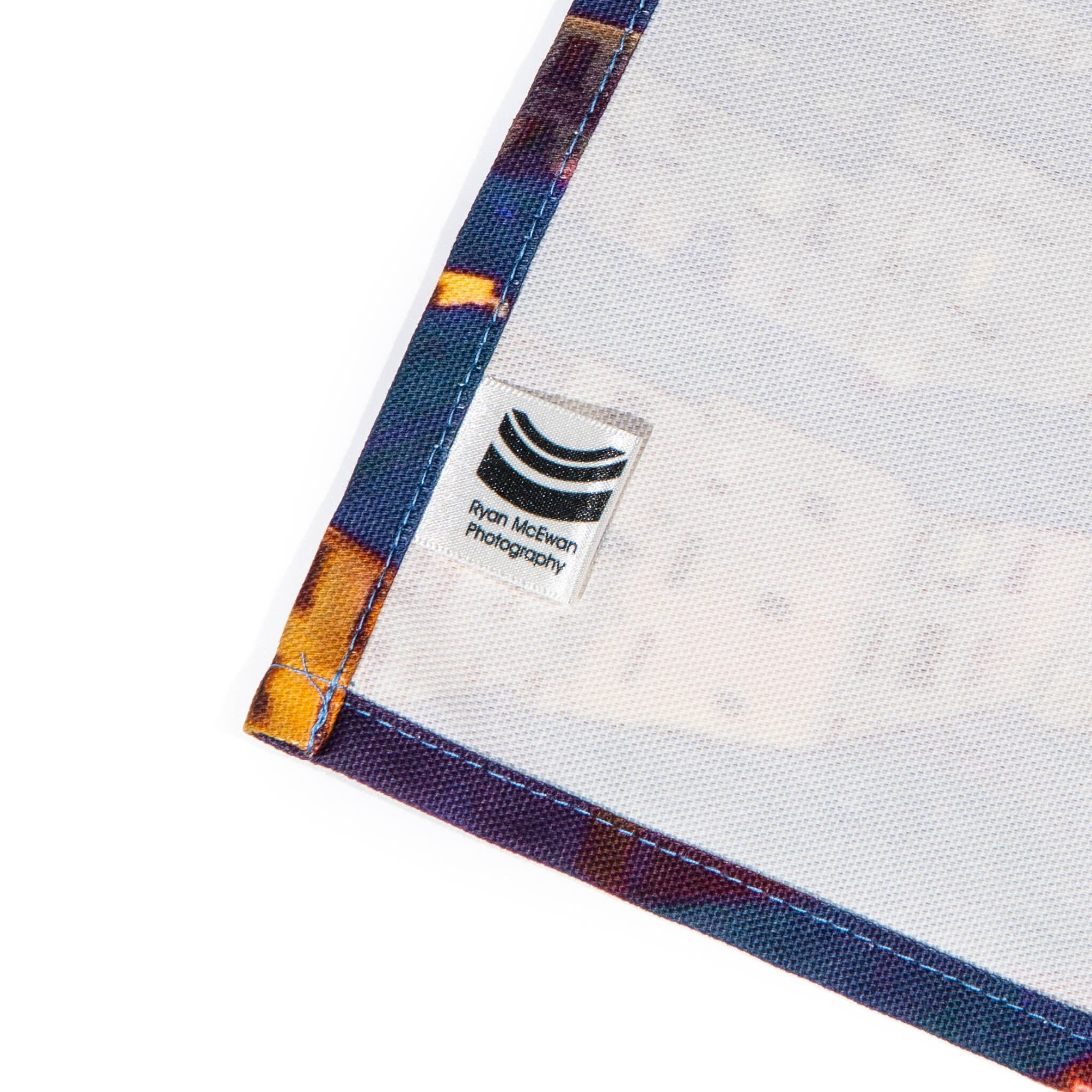 Corner of the back of a tea towel.