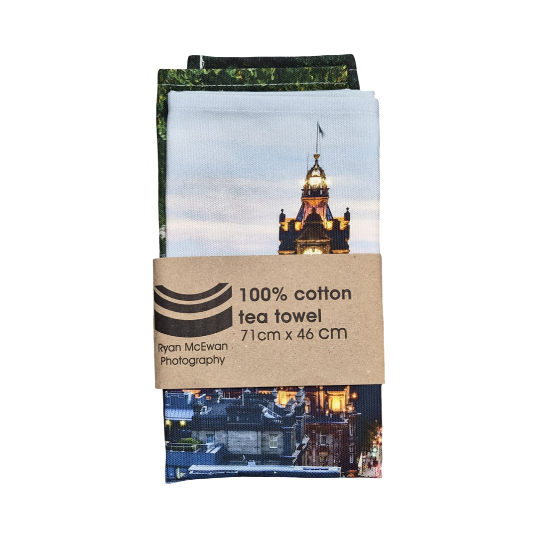 Tea towel with cityscape design and Ryan McEwan Photography branding.
