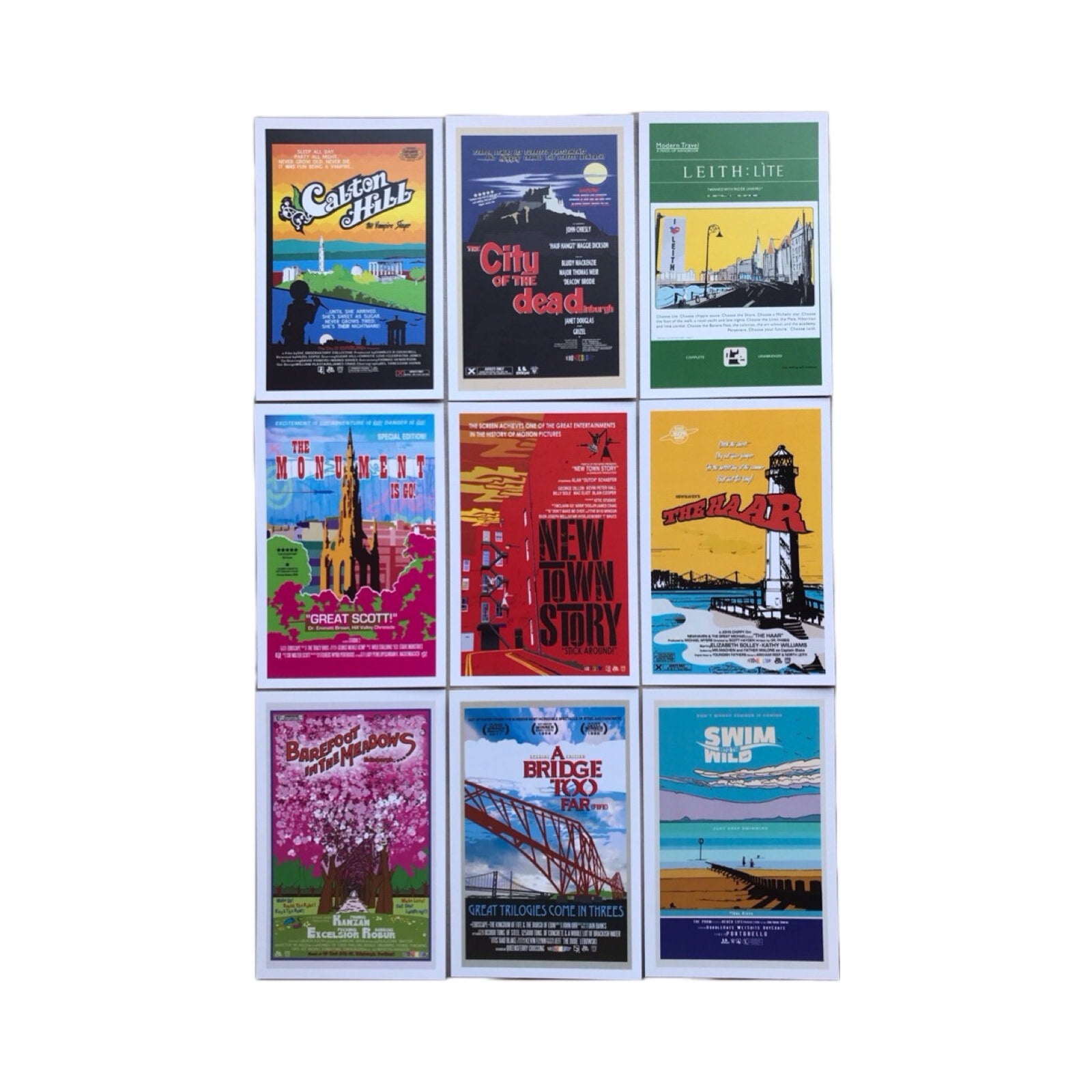 A set of nine A6 postcards featuring a collection of movie poster designs of beloved Edinburgh landmarks