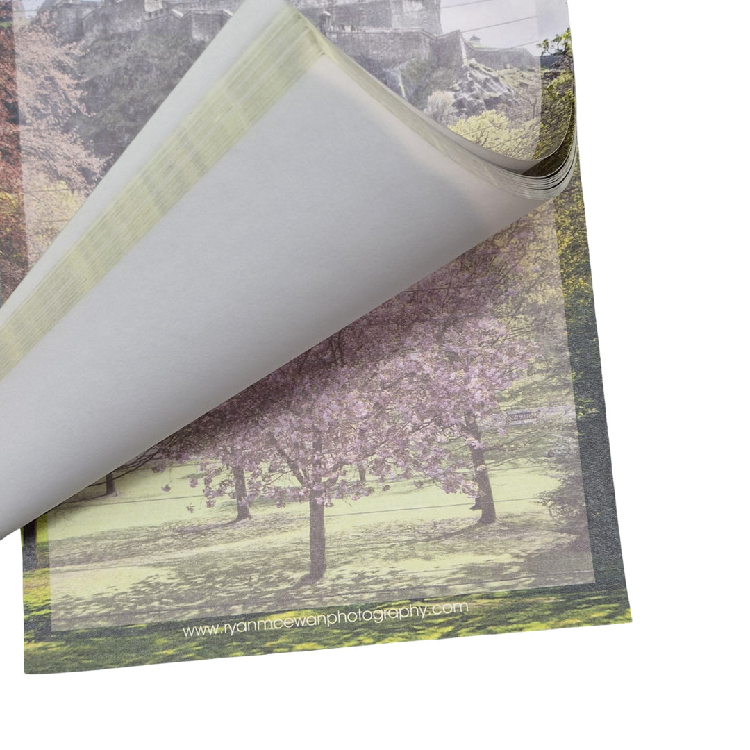 A notepad with an image of Edinburgh Castle on it.