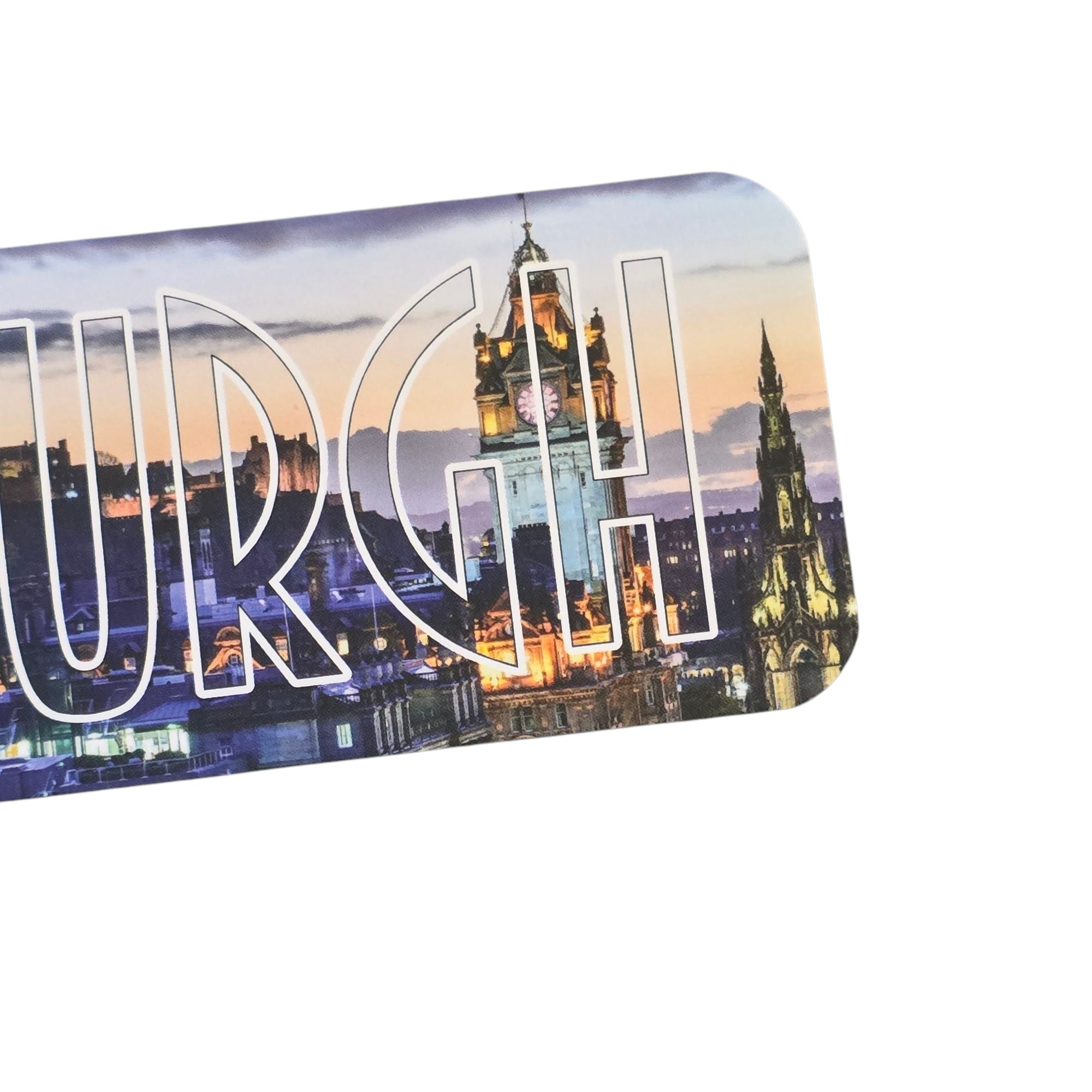Close up of a bookmark featuring the Edinburgh skyline.