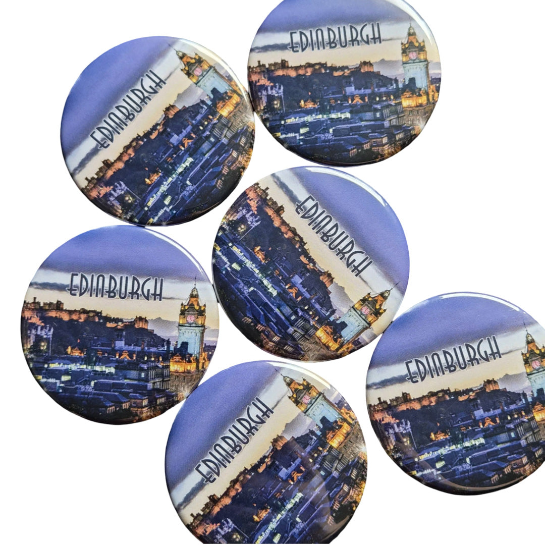 A group of round magnets with the Edinburgh skyline on them.