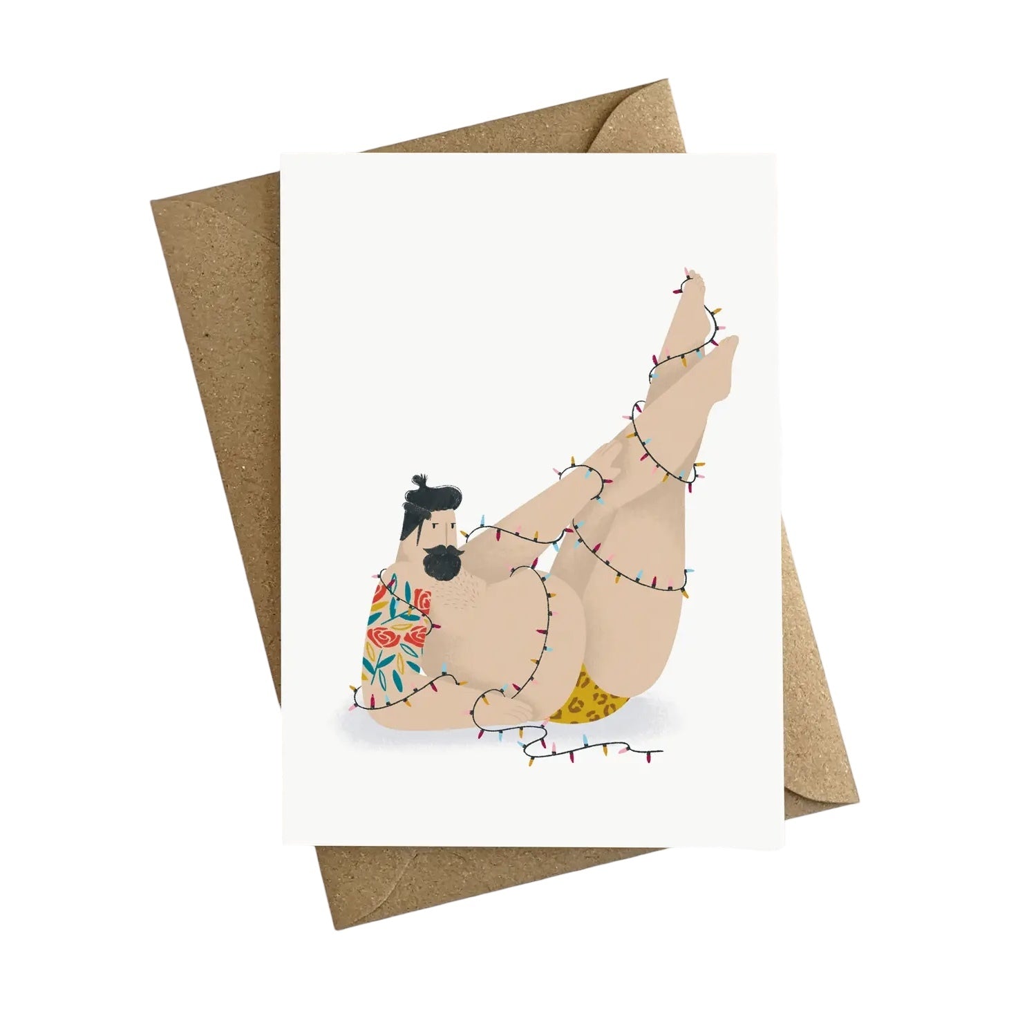 Christmas card featuring an illustration of a sexy, bearded, tattooed man in his leopard print swim trunks wrapped up in fairy lights.