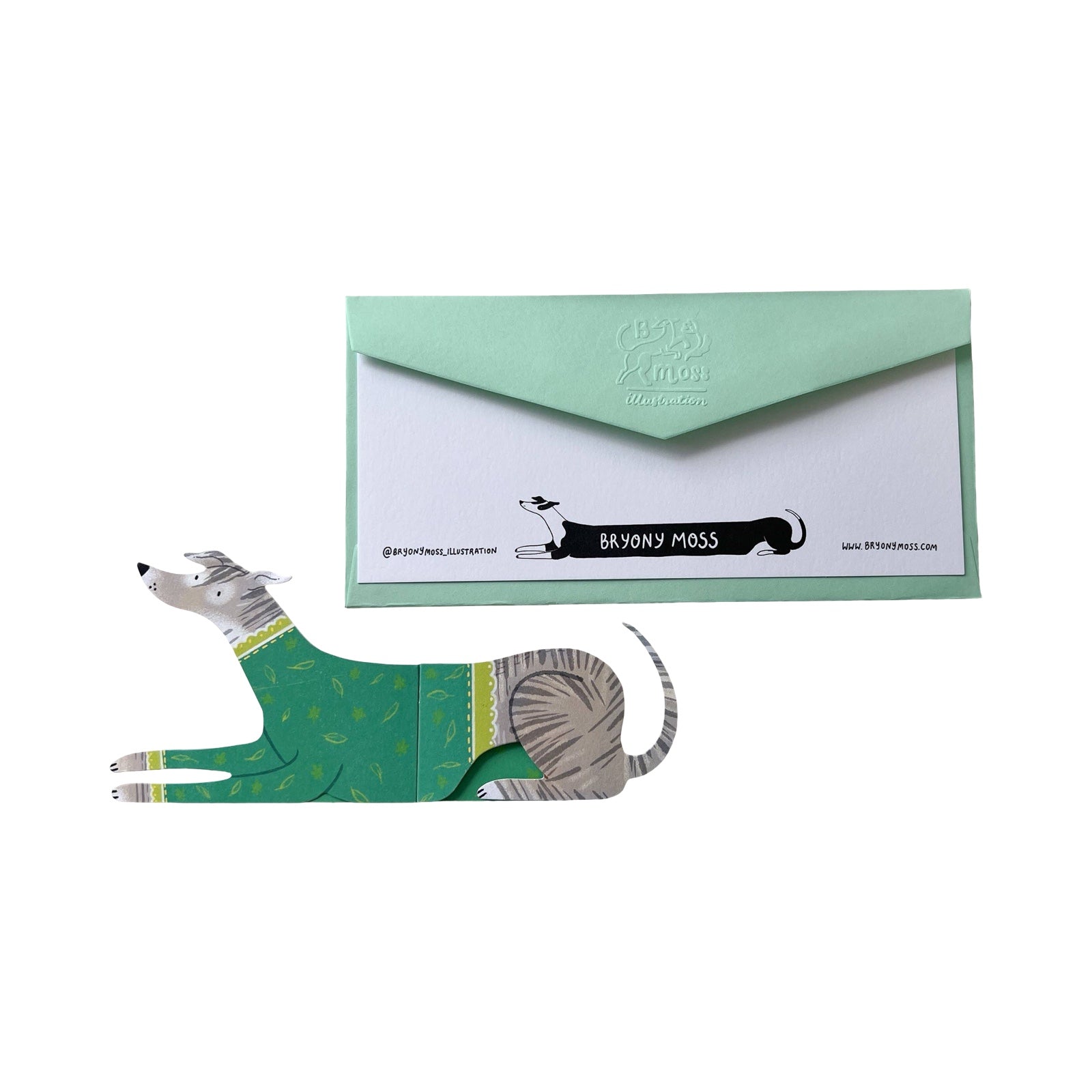This dog-shaped card opens out to reveal a ridiculously long dog! 'Fern' is wearing a green jumper with lime green cuffs.