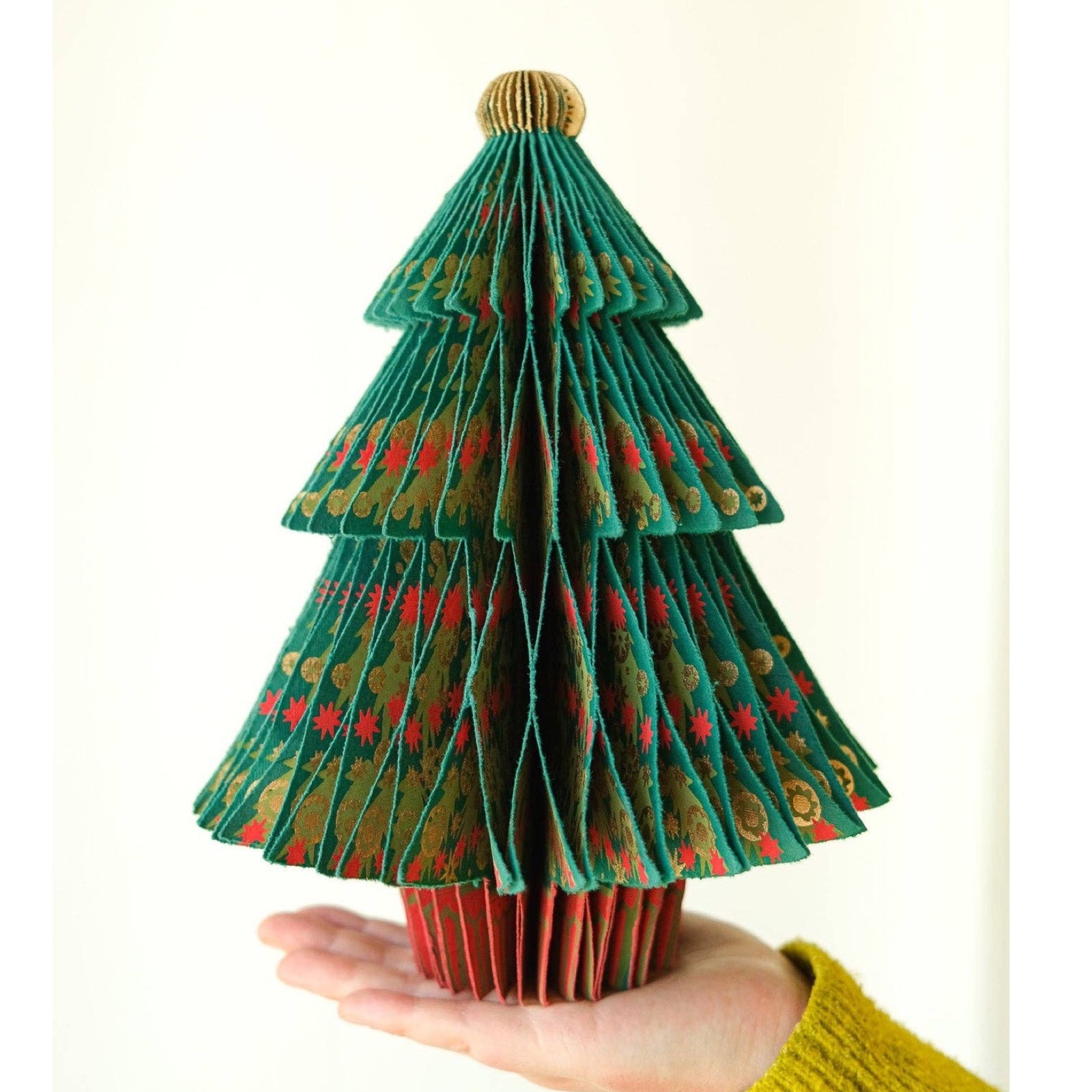 These gorgeous honeycomb Christmas fir trees are made from recycled cotton paper.