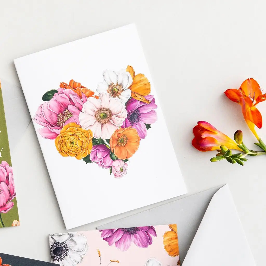 Floral greeting card with colourful flowers on a white background.