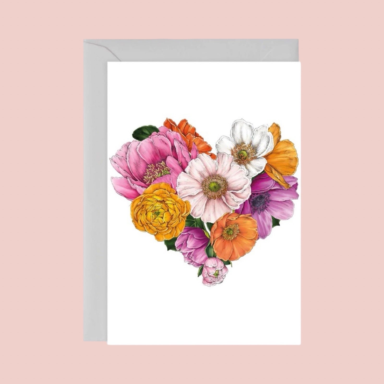Floral card with colourful flowers on a light pink background.
