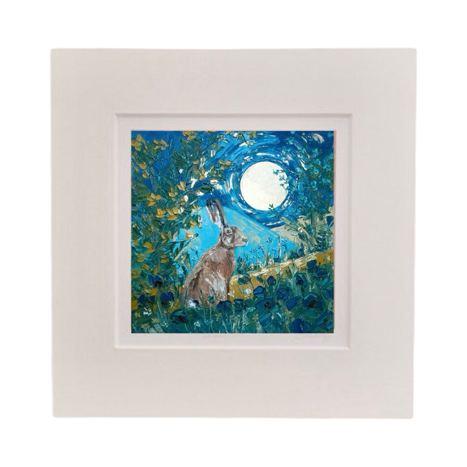 This square print features a hare sitting at the edge of a forest under the moon in a white cardboard mount.