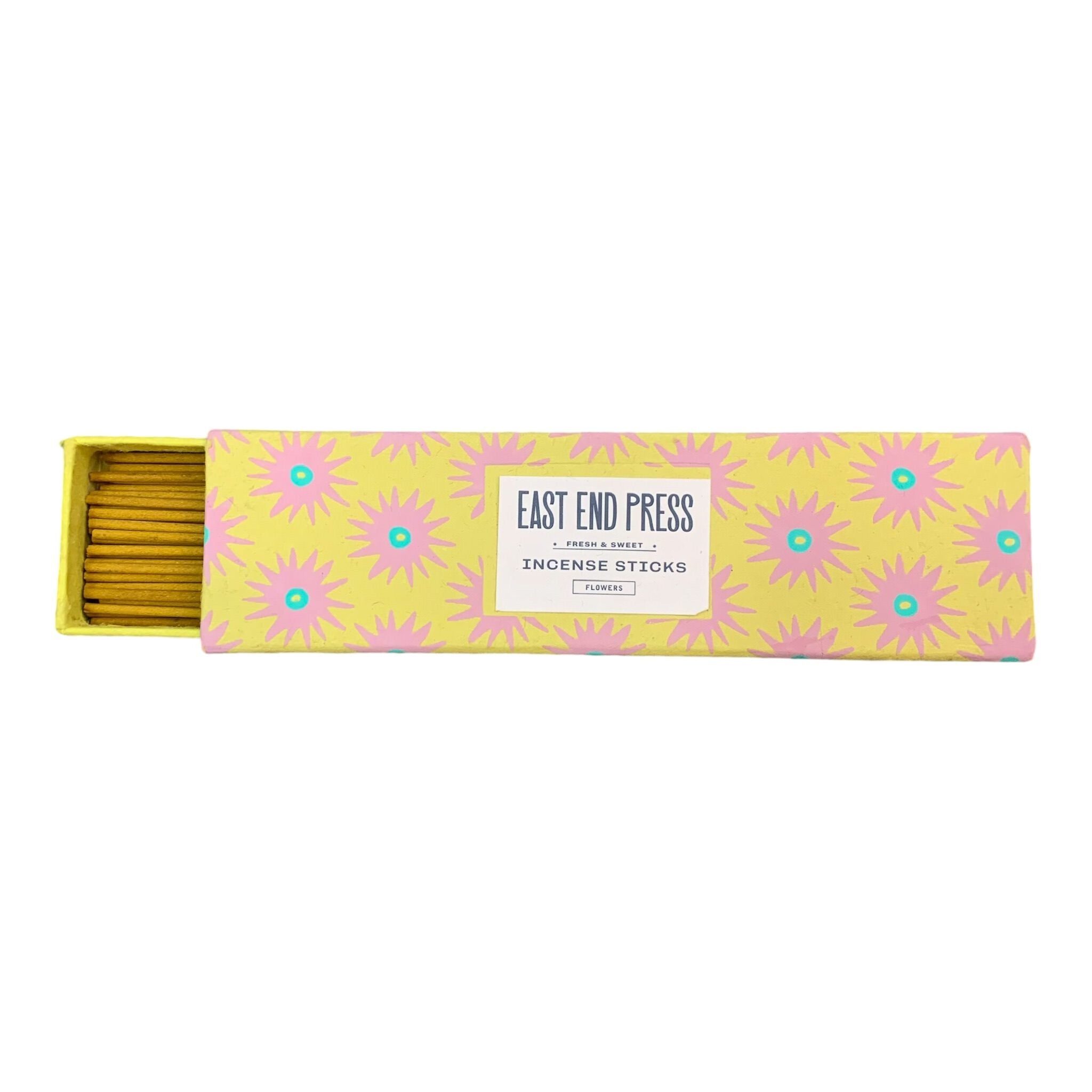 Yellow flowers scented incense sticks in a yellow box with pink flowers.
