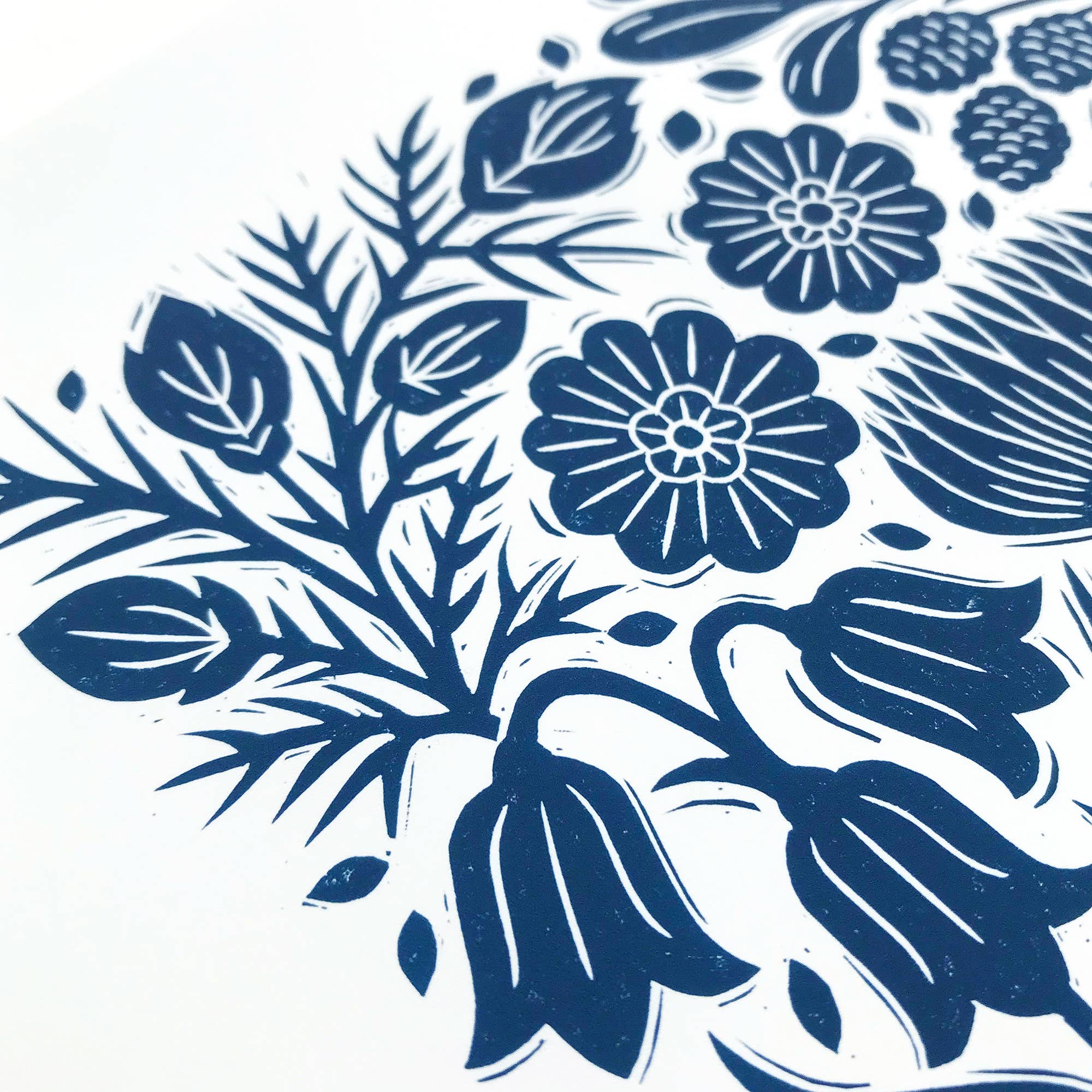 Blue floral pattern on a white background.