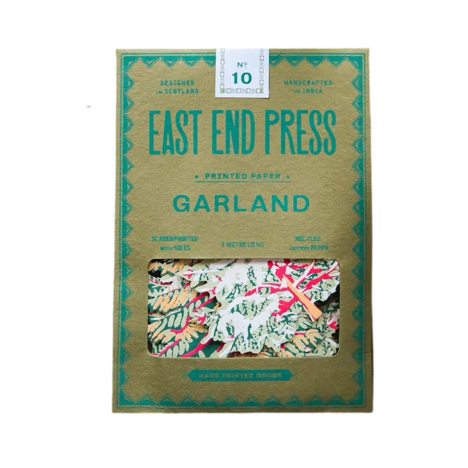 A green paper packet containing a forest paper garland