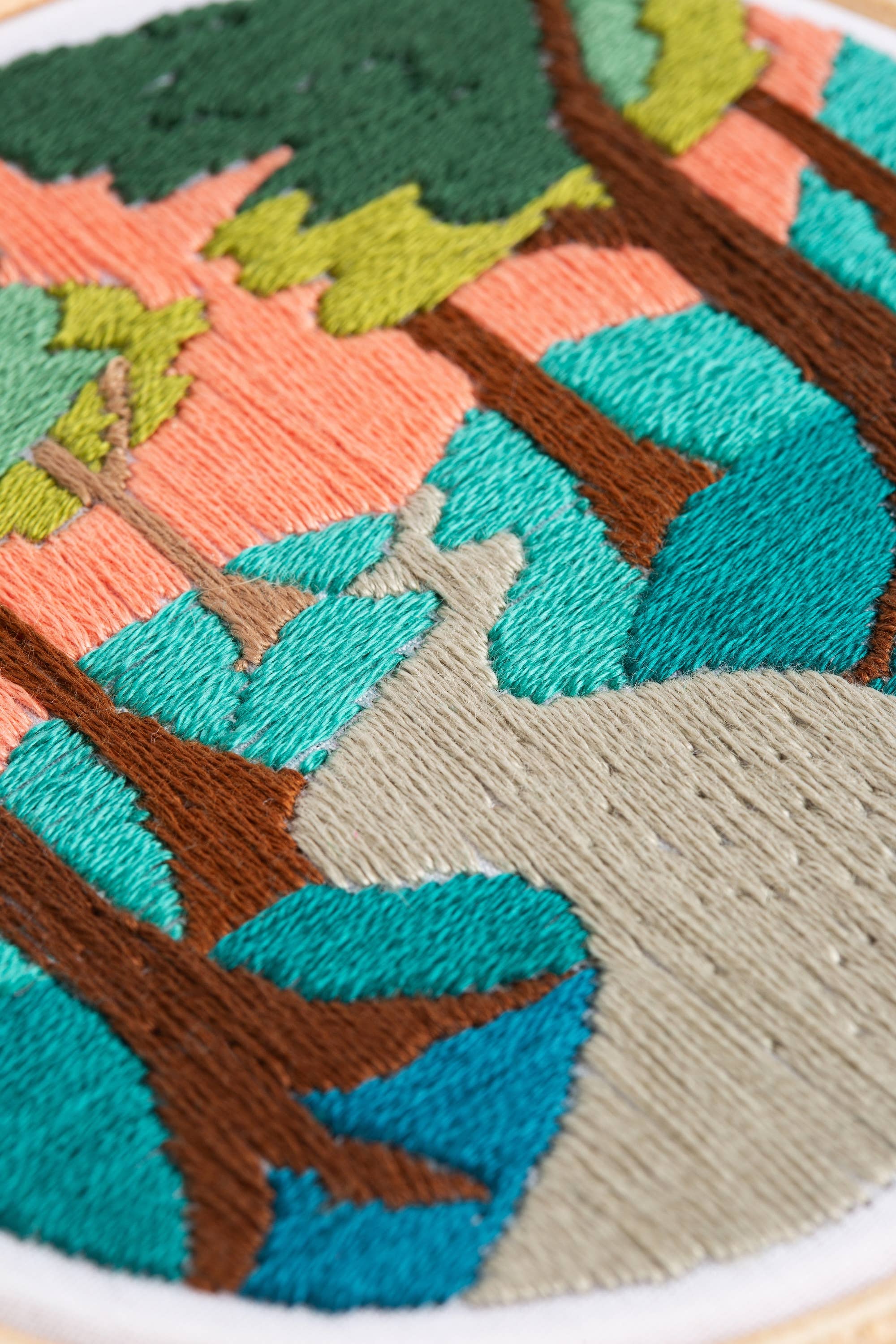Embroidered forest walk landscape in autumnal shades.