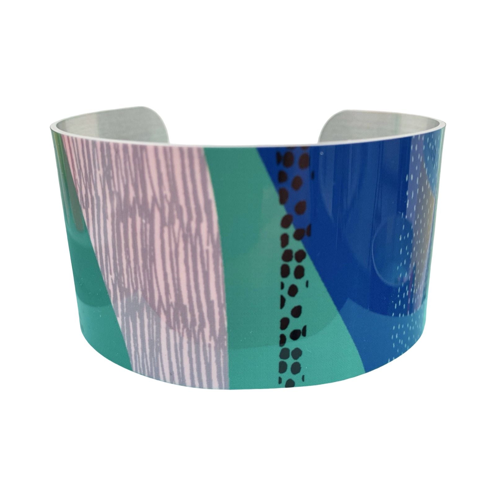 Multicoloured cuff bracelet on a white background.