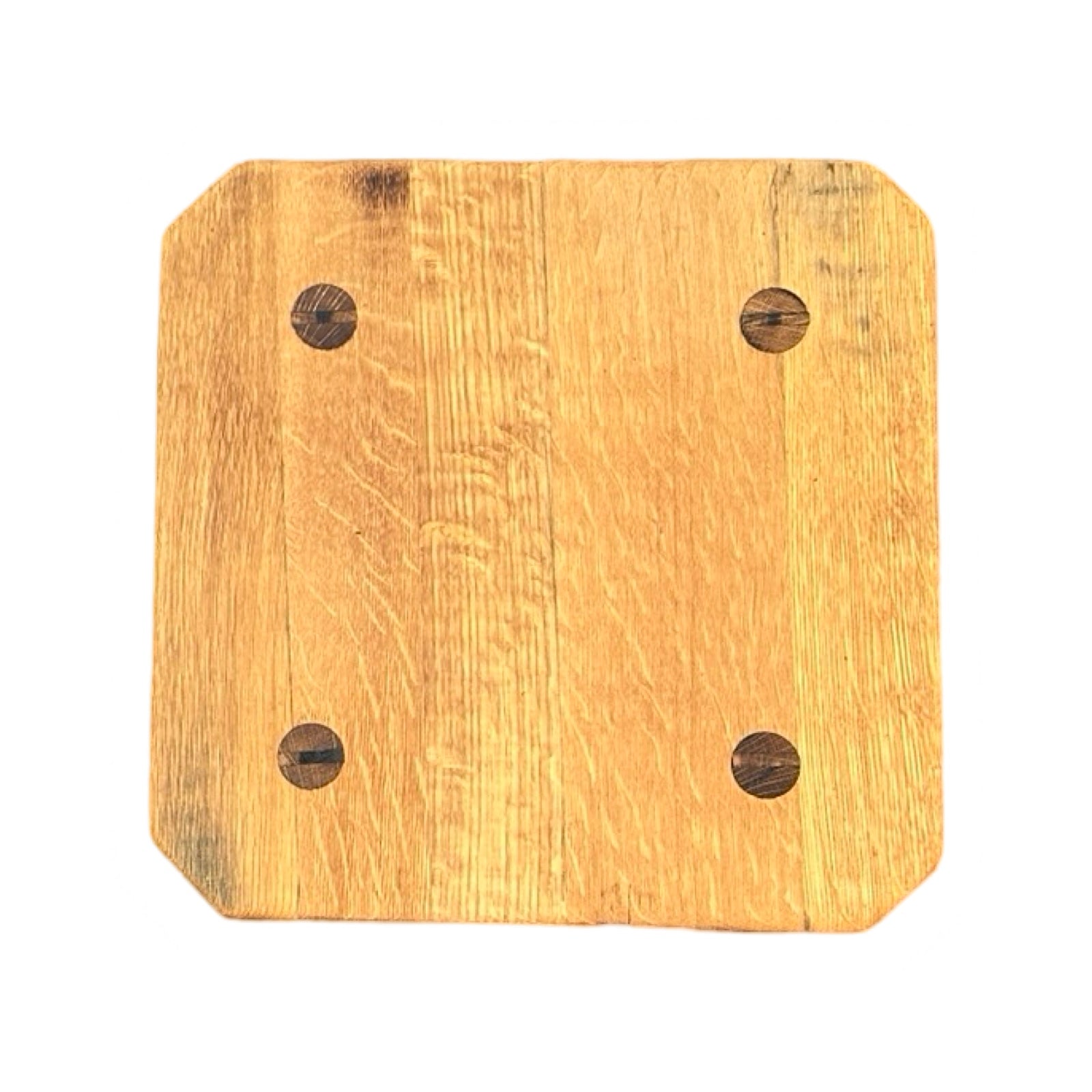 The top of a wooden stool made form whisky barrels.