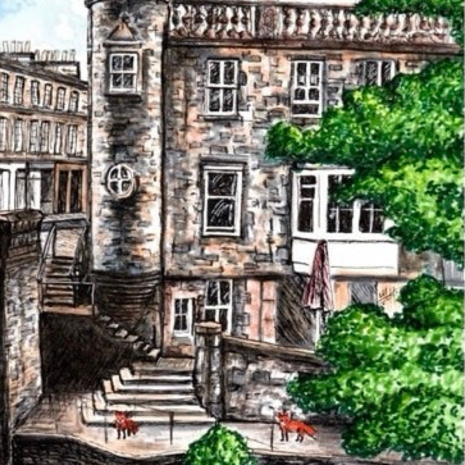 A beautifully illustrated print of a pair of foxes at the bottom of the steps below the clock tower in Stockbridge, Edinburgh.