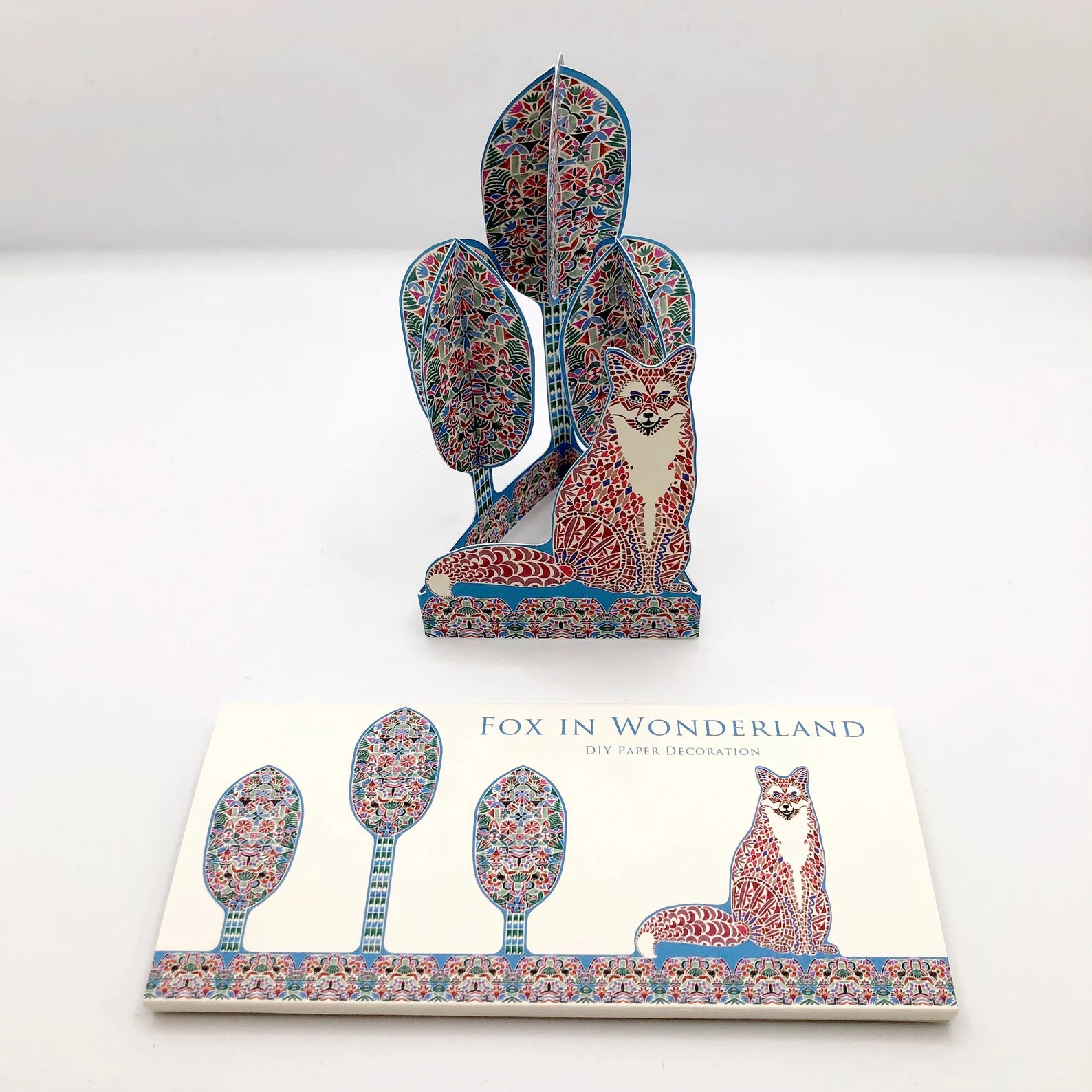 Decorative wall art with a fox design on a white background.