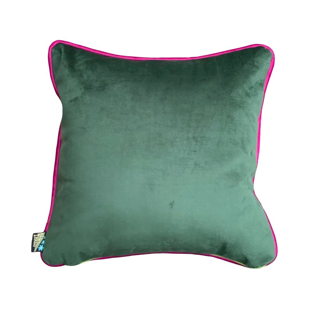 Green velvet back of funky fish cushion.