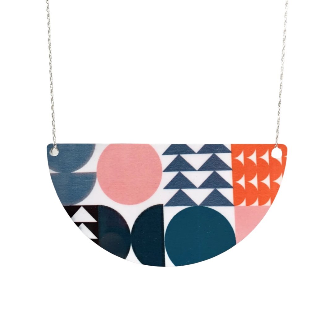 Large geometric aluminium arc necklace.