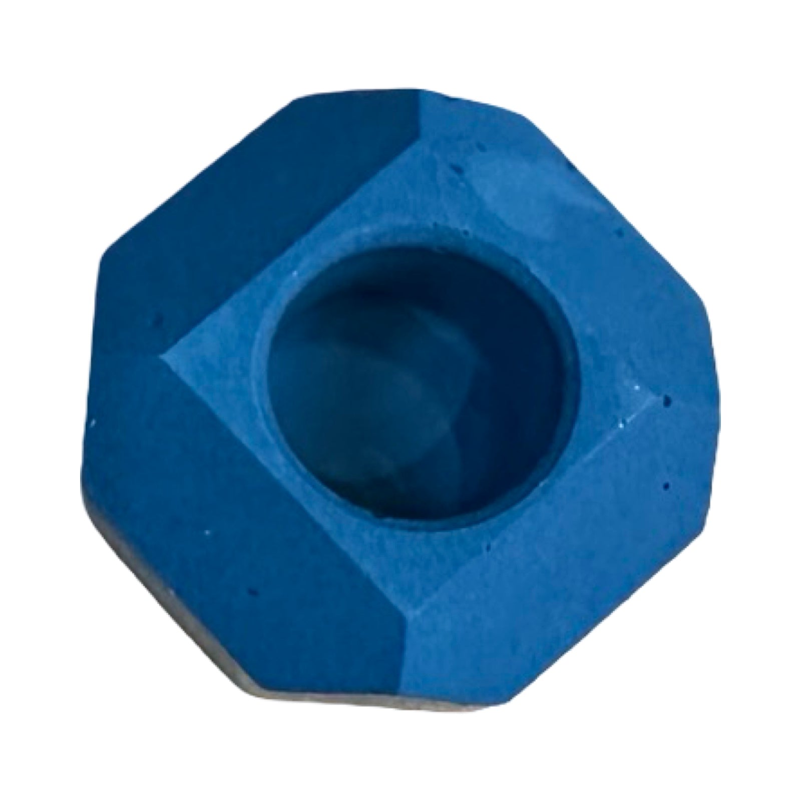 The top of a small geometric shaped dinner candle holder in navy.