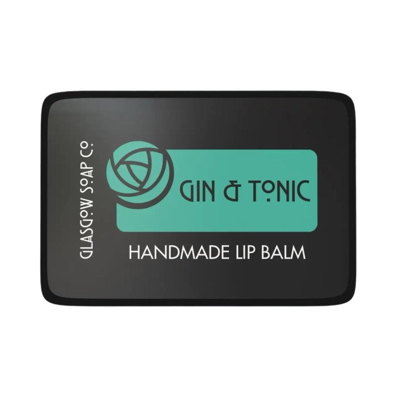 A small black tin of gin and tonic lip balm