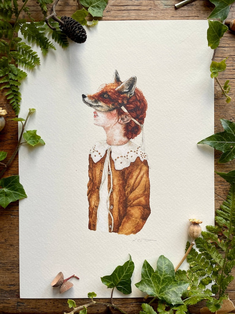 An art print of a girl wearing a fox mask, dressed in a white shirt with a fabulous lace collar and a brown coat, and surrounded by leaves and acorns.