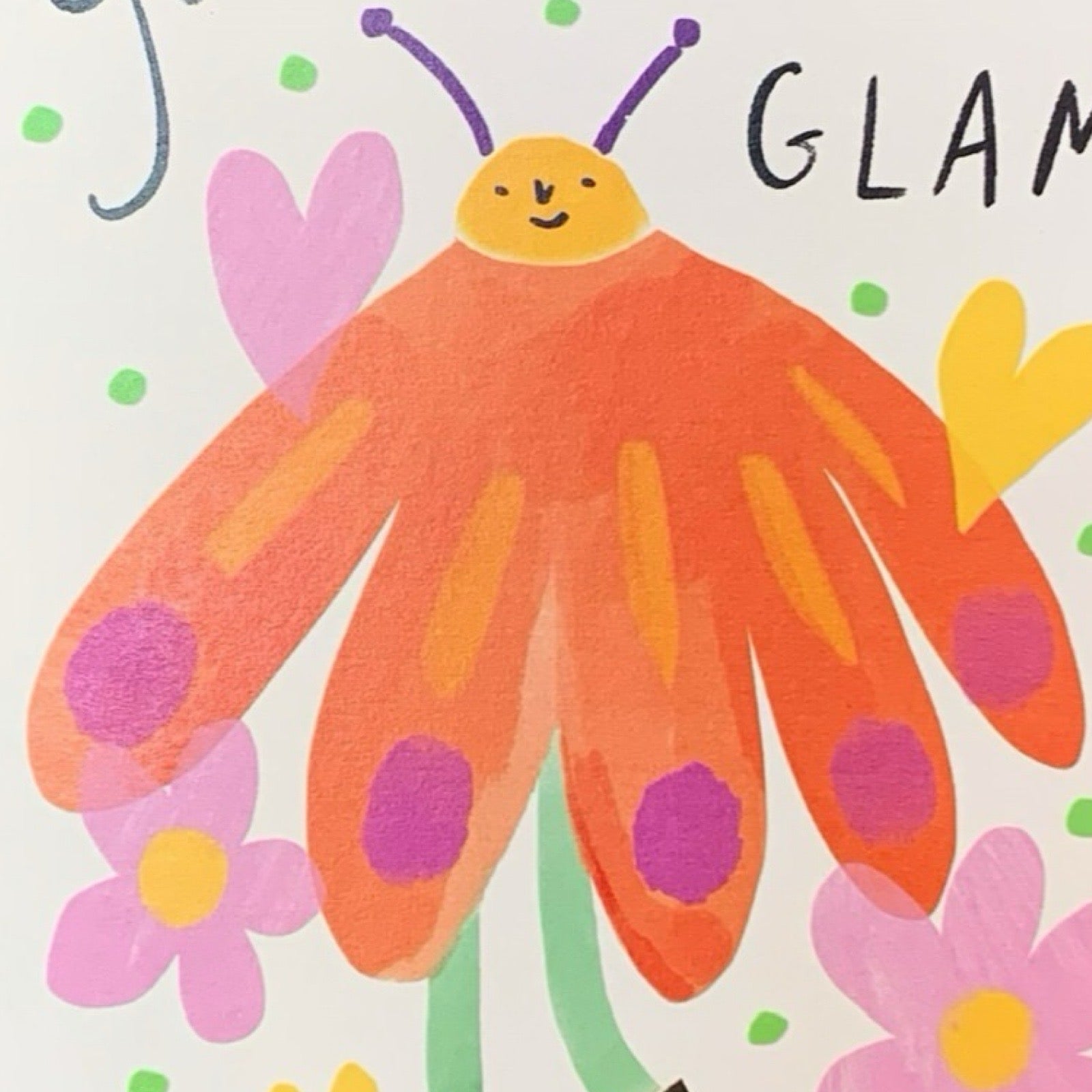 Friendship card featuring a person with butterfly wings surrounded by flowers and the text 'you're the most glam person I know''.