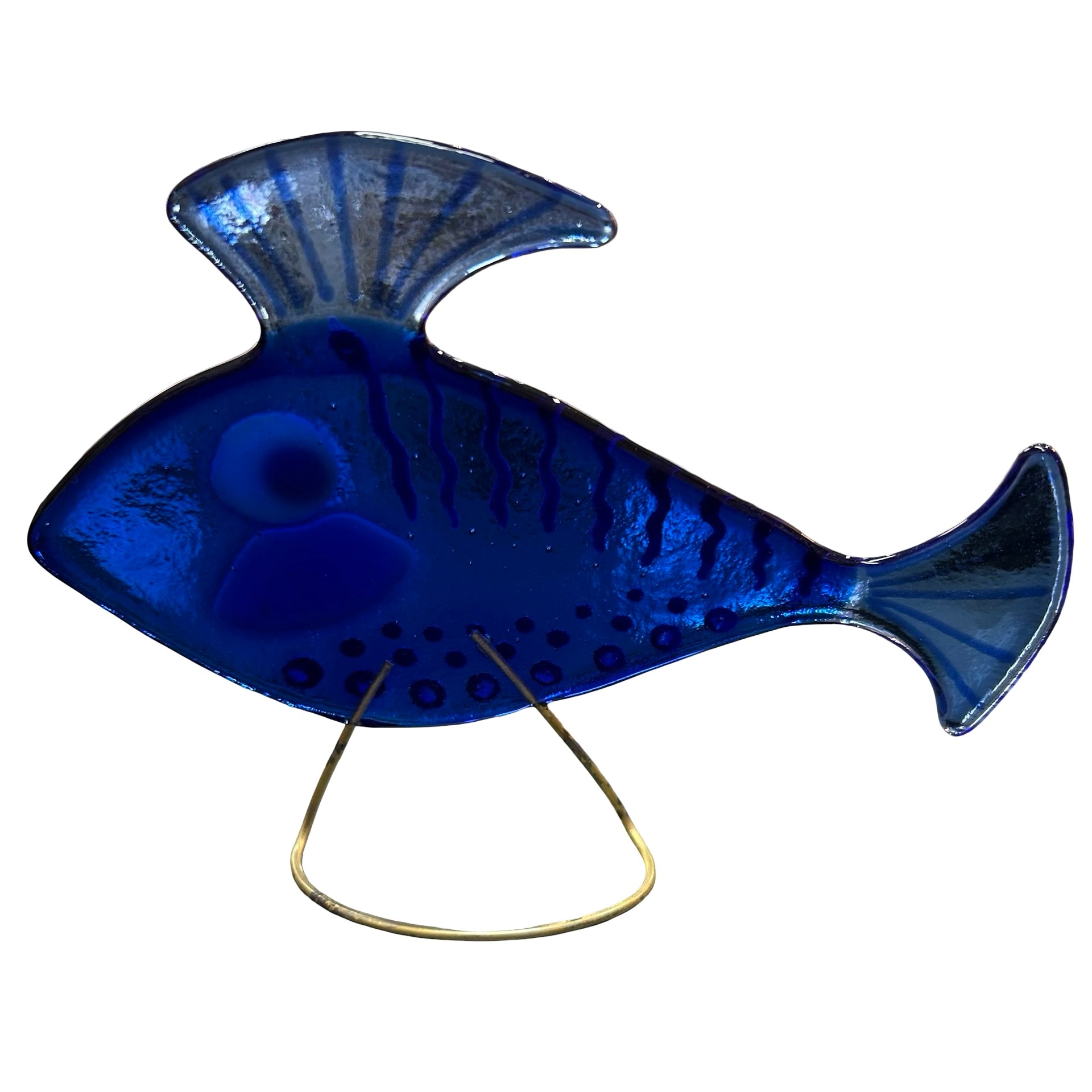 Blue glass fish ornament on a white background.